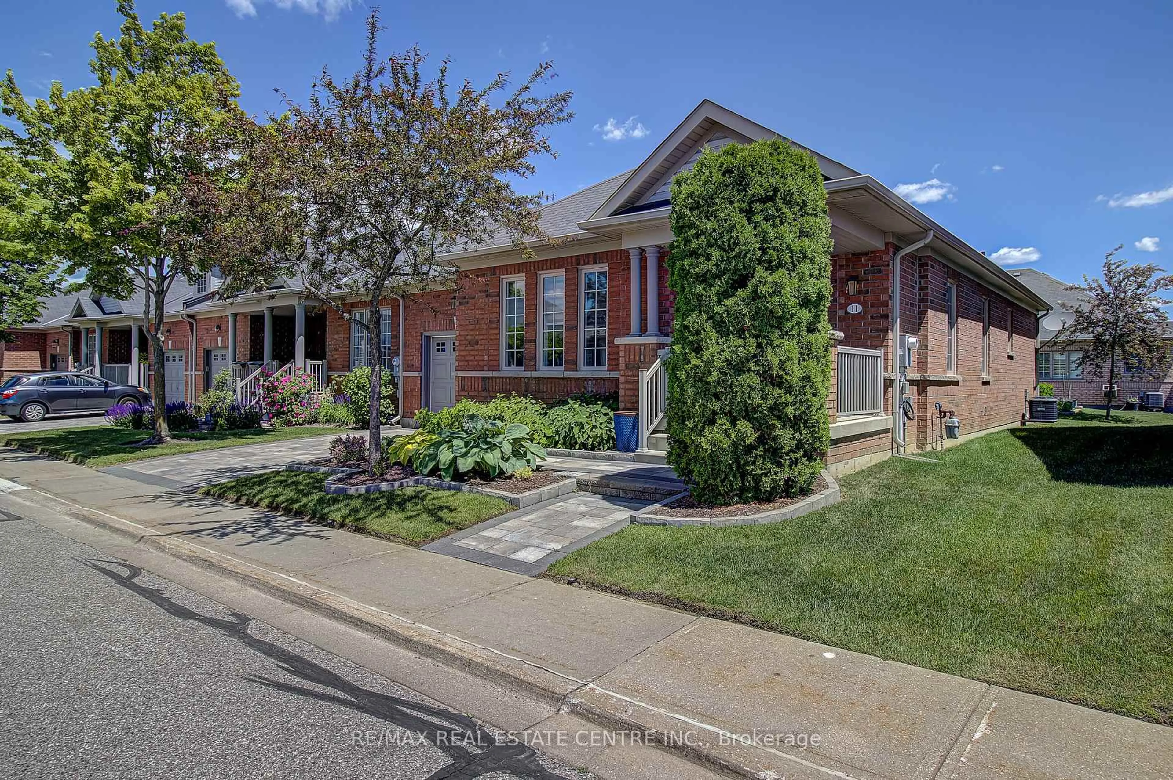 Home with brick exterior material, street for 11 Fairvalley St, Brampton Ontario L6R 0W2