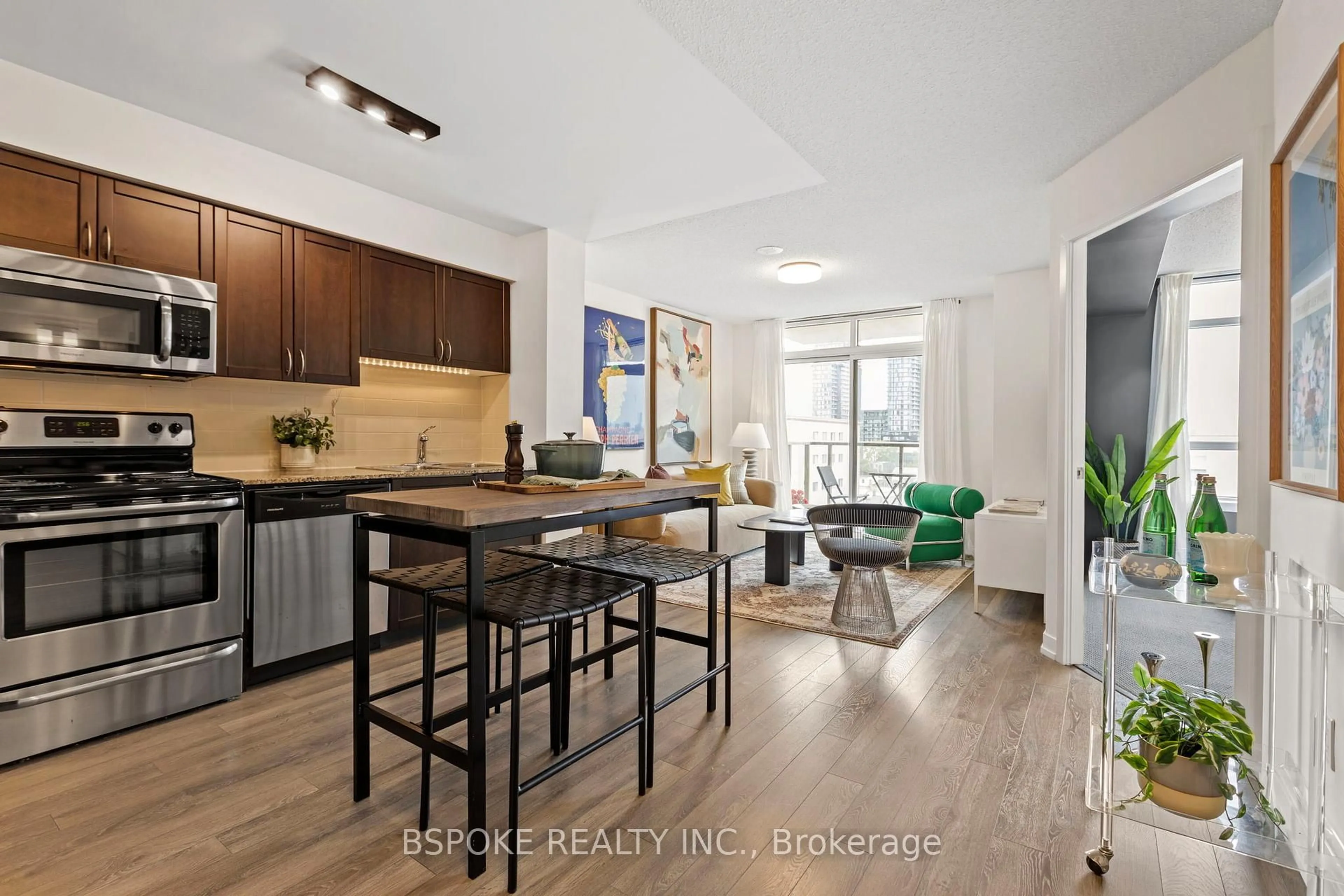 Open concept kitchen, wood/laminate floor for 812 Lansdowne Ave #722, Toronto Ontario M6H 4K5