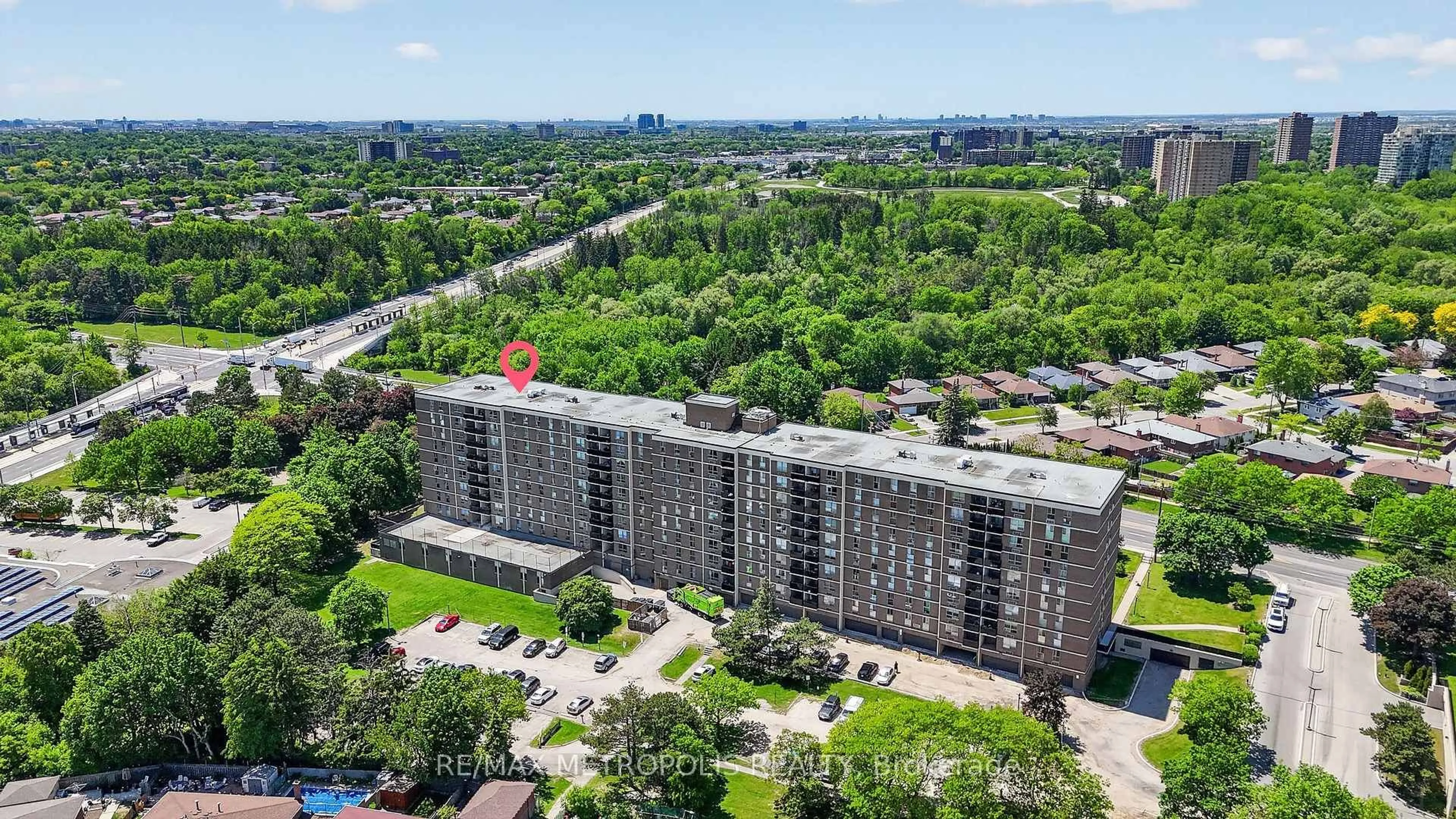 A pic from outside/outdoor area/front of a property/back of a property/a pic from drone, city buildings view from balcony for 2825 Islington Ave #104, Toronto Ontario M9L 2K1