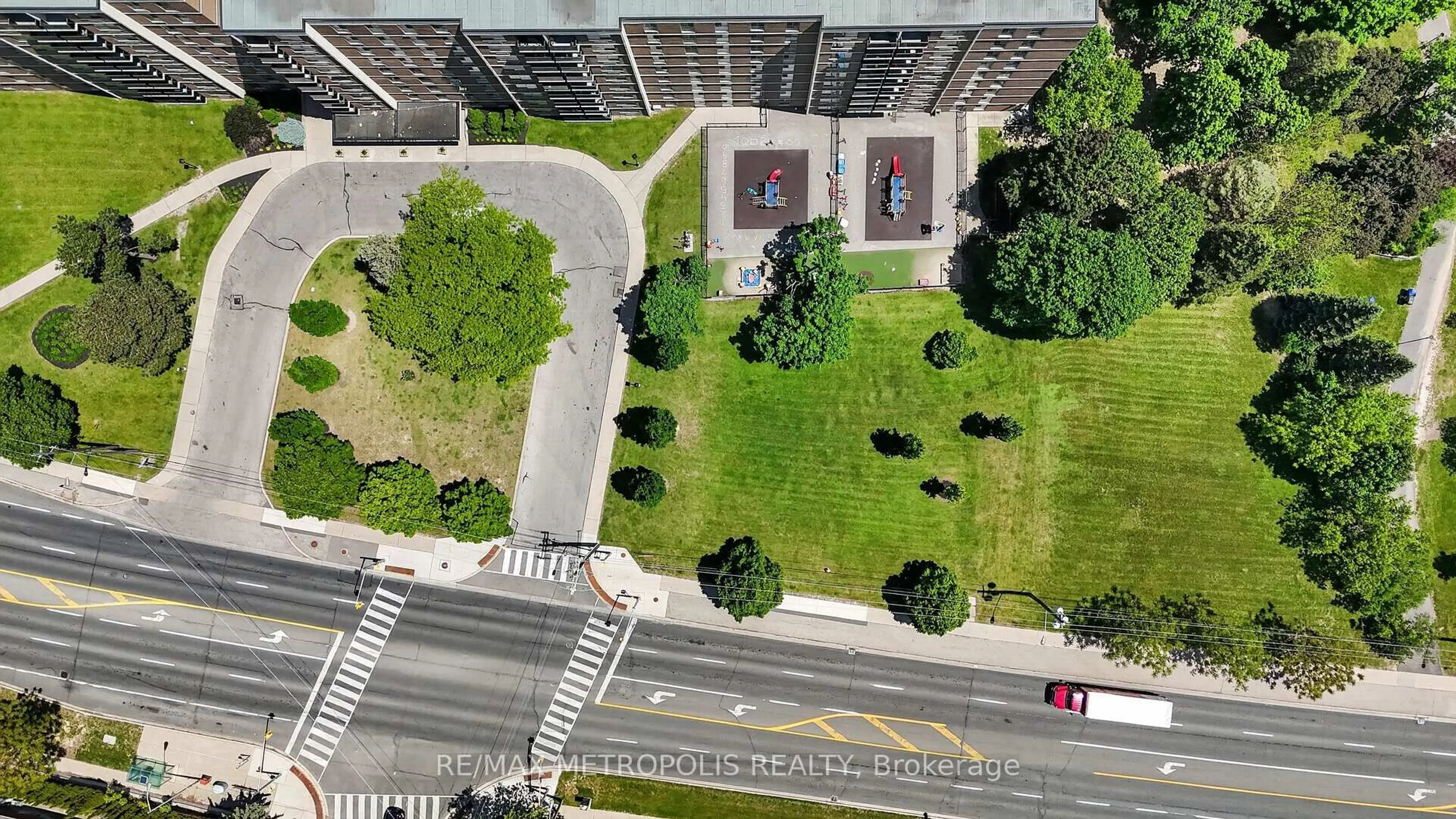 A pic from outside/outdoor area/front of a property/back of a property/a pic from drone, city buildings view from balcony for 2825 Islington Ave #104, Toronto Ontario M9L 2K1