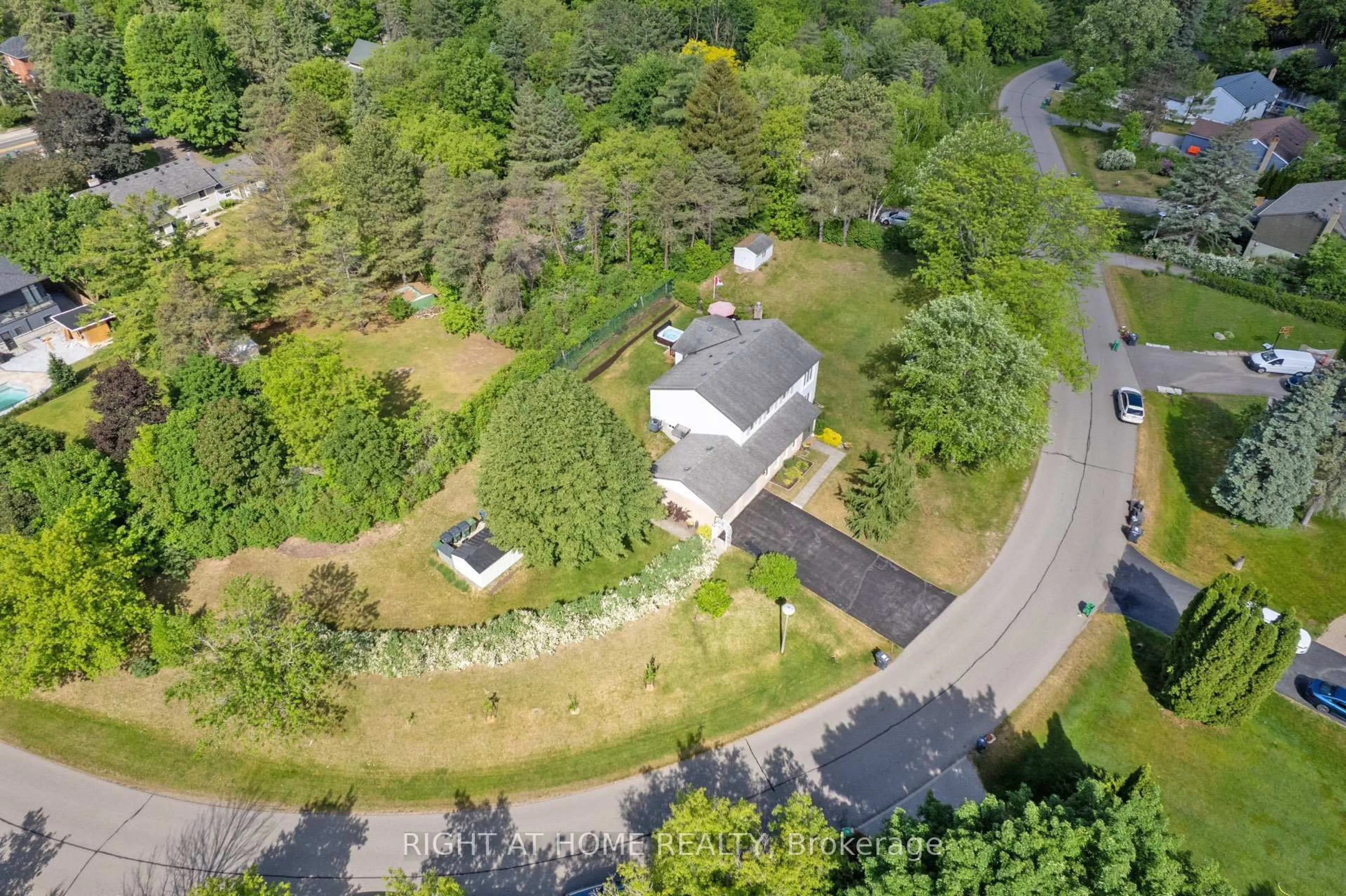 A pic from outside/outdoor area/front of a property/back of a property/a pic from drone, forest/trees view for 10 Munro St, Caledon Ontario L7E 0L6