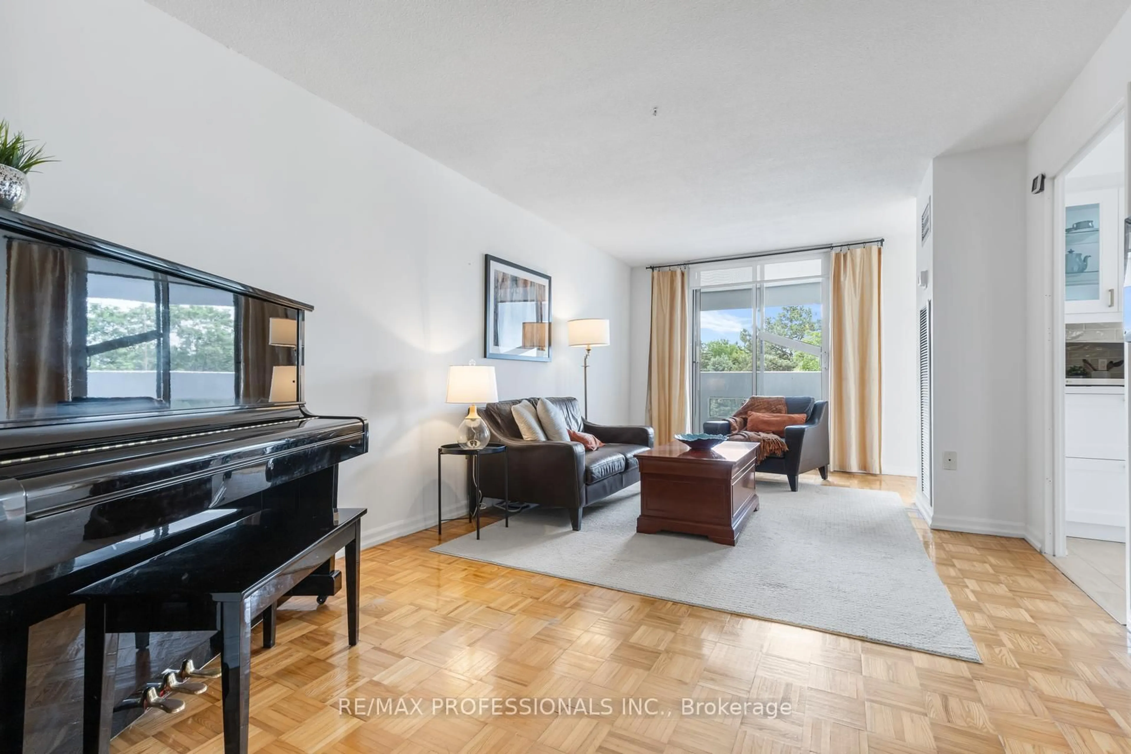 Living room with furniture, unknown for 475 The West Mall #406, Toronto Ontario M9C 4Z3