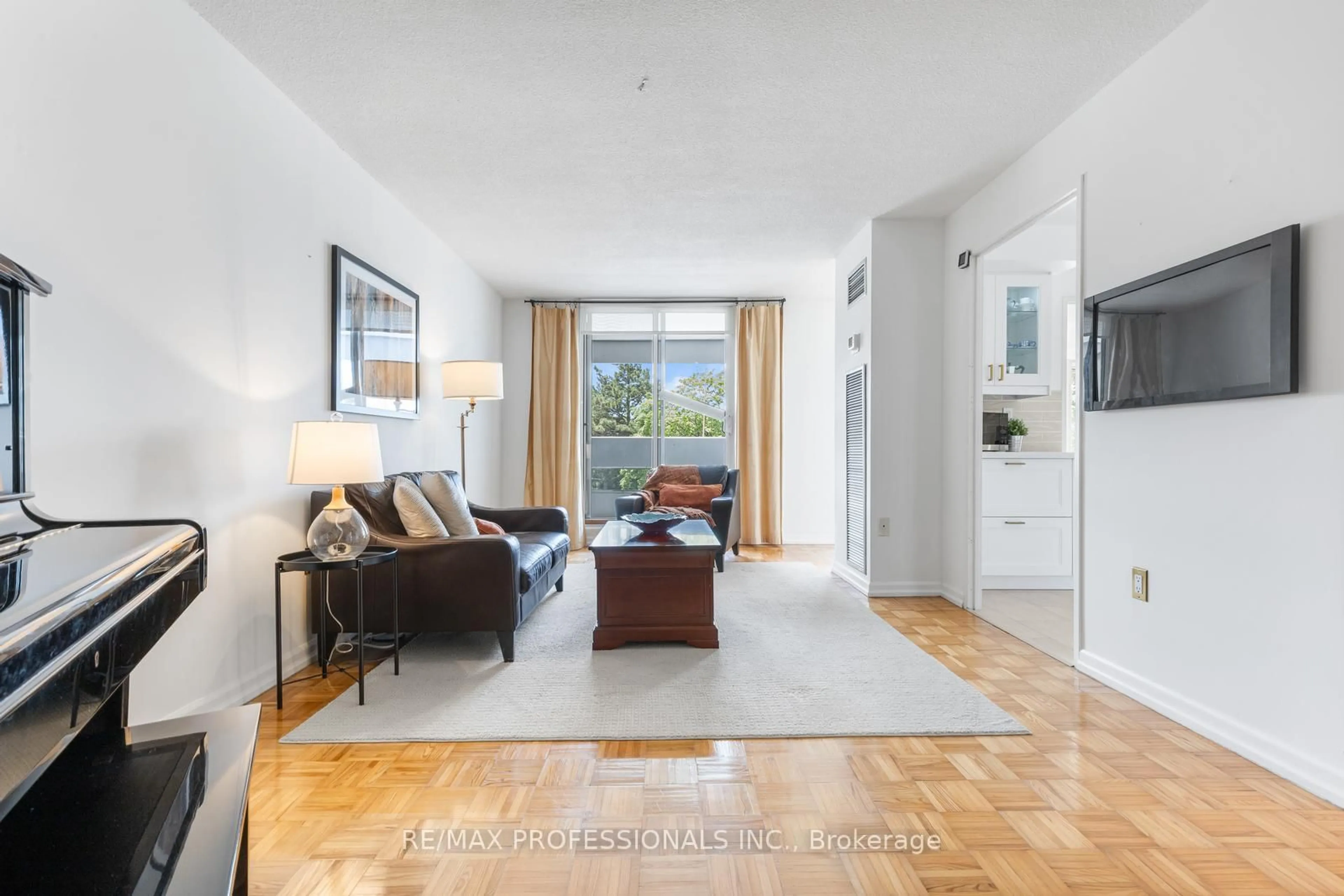 Living room with furniture, unknown for 475 The West Mall #406, Toronto Ontario M9C 4Z3