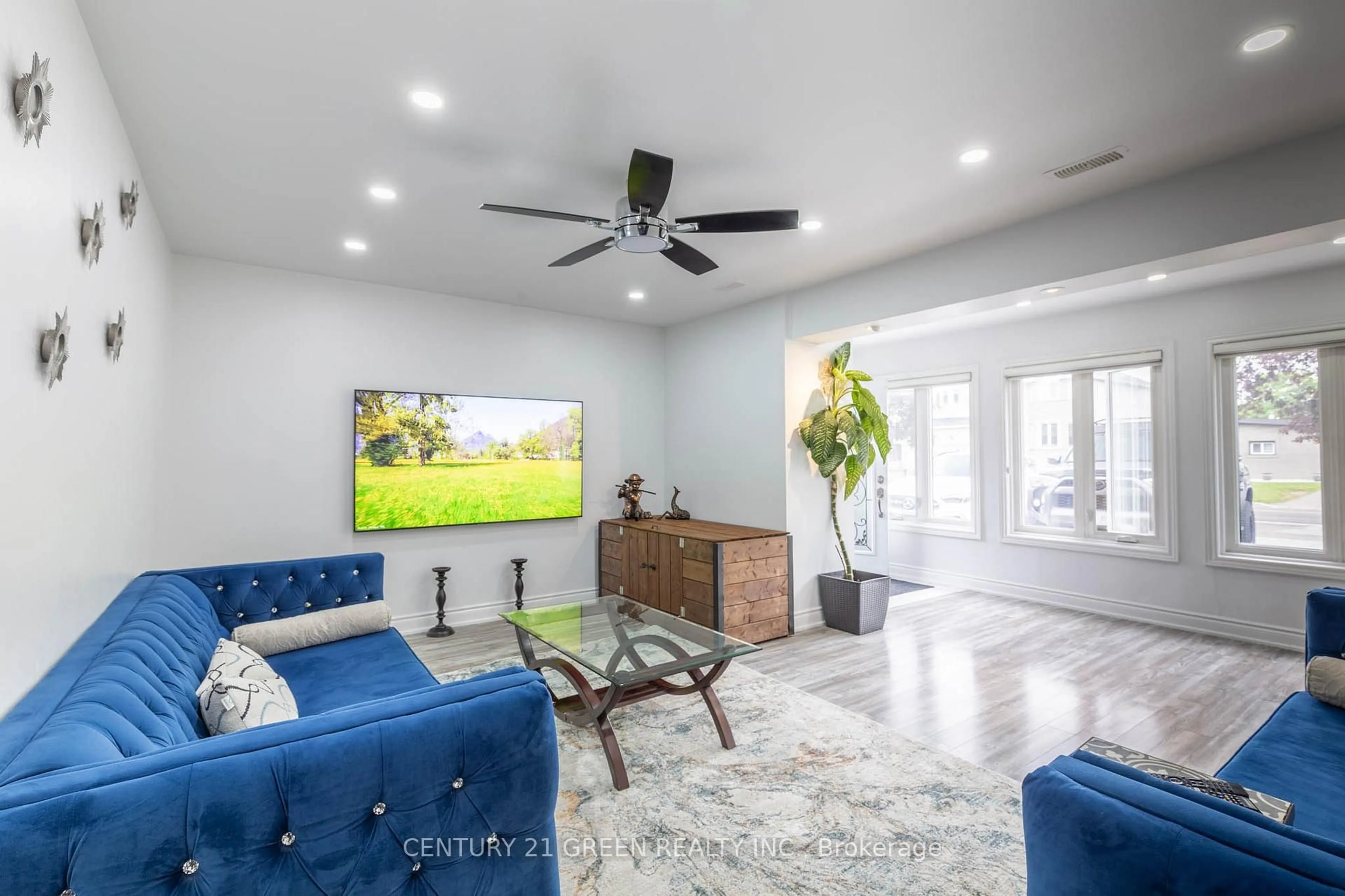 Living room with furniture, ceramic/tile floor for 7649 Redstone Rd, Mississauga Ontario L4T 2B7