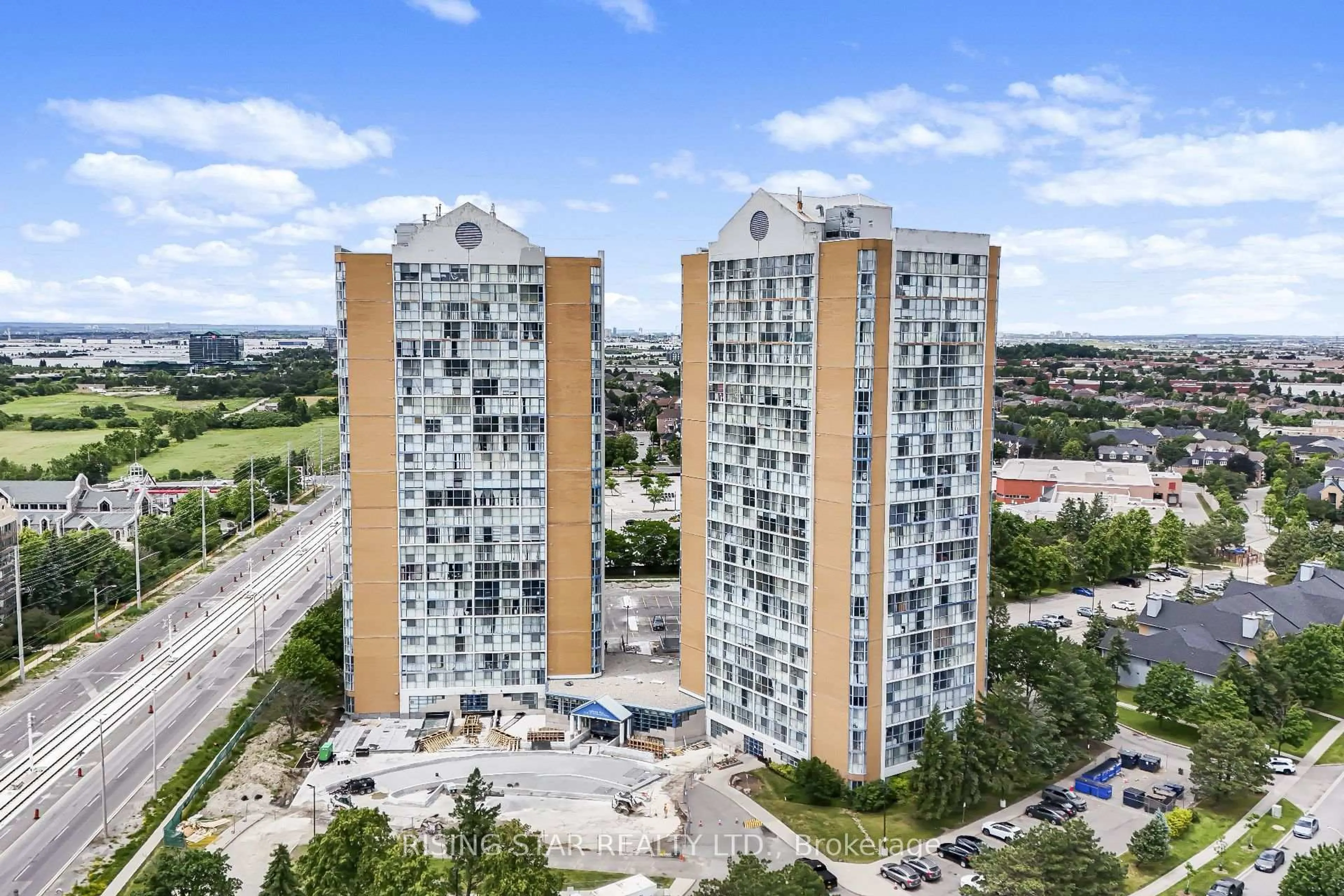 A pic from outside/outdoor area/front of a property/back of a property/a pic from drone, city buildings view from balcony for 35 Trailwood Dr #311, Mississauga Ontario L4Z 3L6
