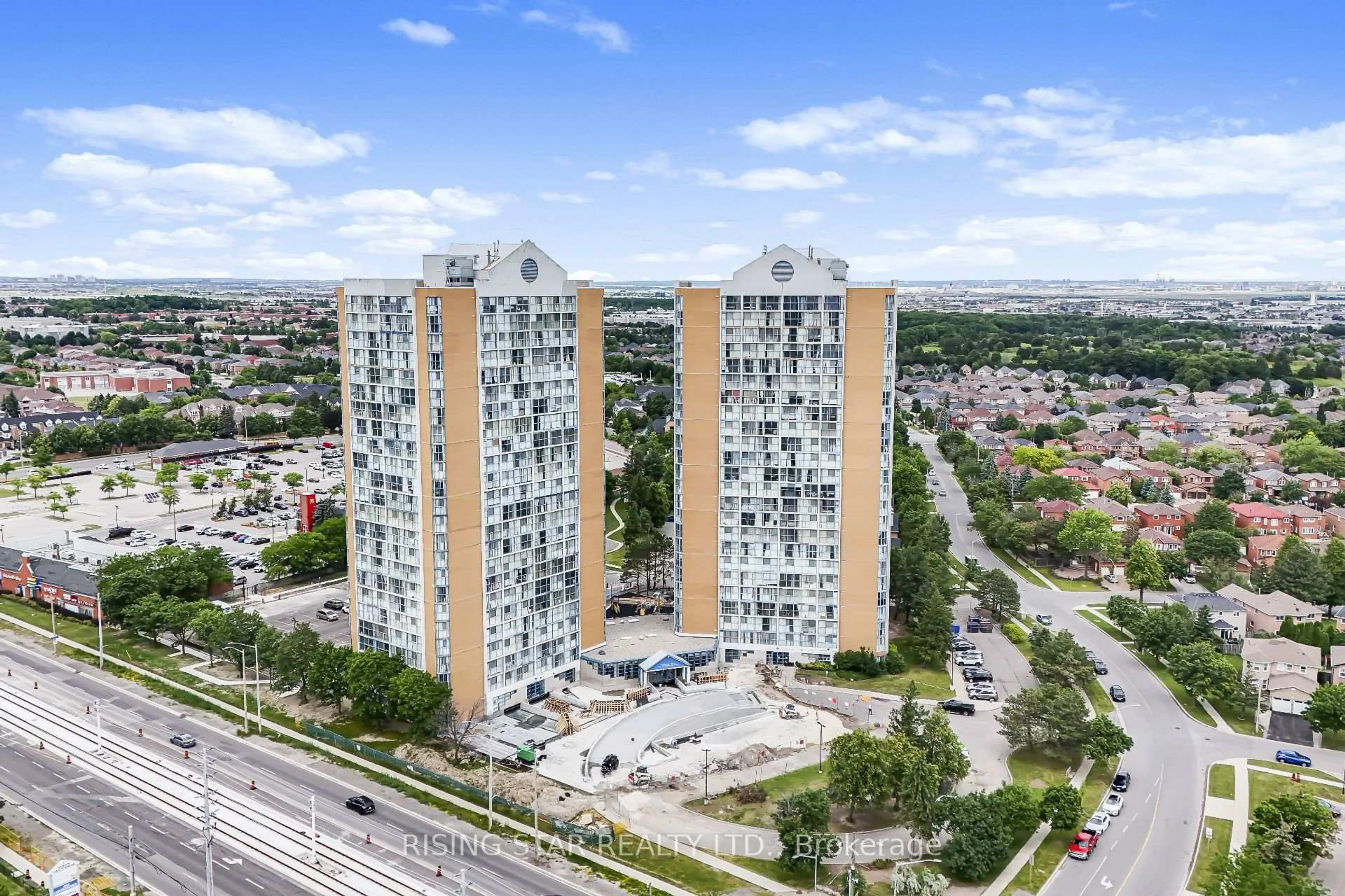 A pic from outside/outdoor area/front of a property/back of a property/a pic from drone, city buildings view from balcony for 35 Trailwood Dr #311, Mississauga Ontario L4Z 3L6