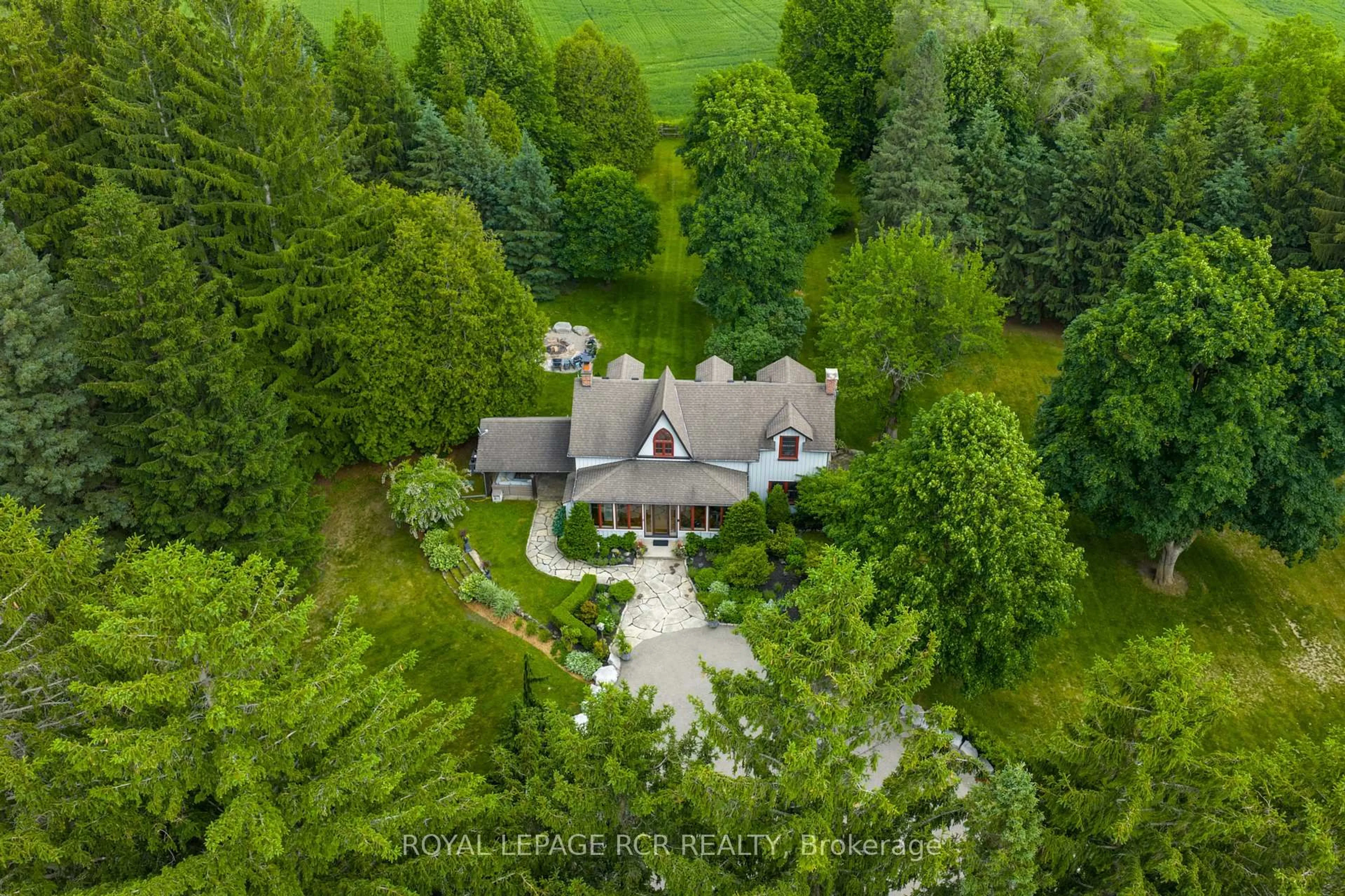 A pic from outside/outdoor area/front of a property/back of a property/a pic from drone, forest/trees view for 4075 The Grange Sdrd, Caledon Ontario L7C 0G2