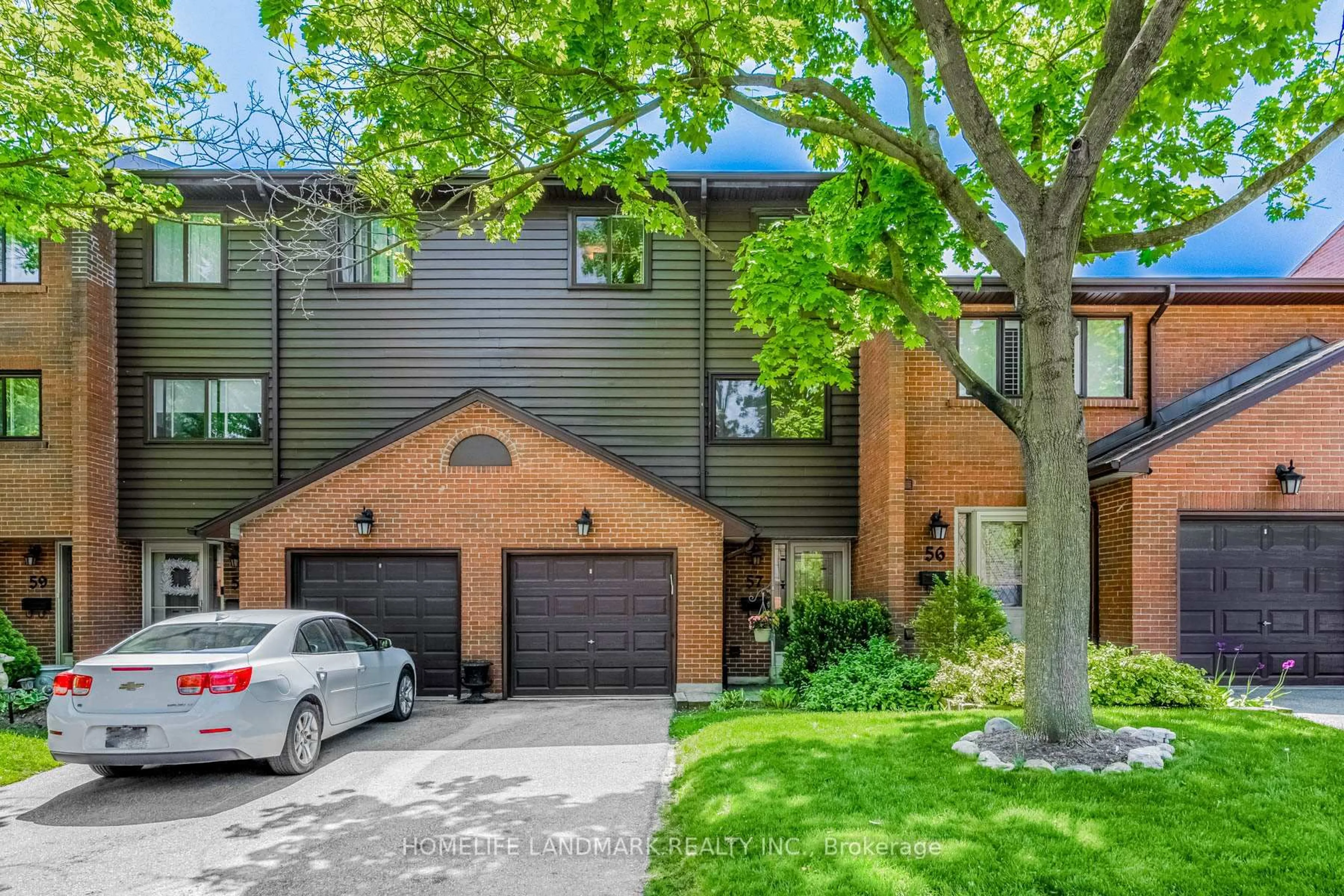 Home with brick exterior material, street for 4165 Fieldgate Dr #57, Mississauga Ontario L4W 2M9