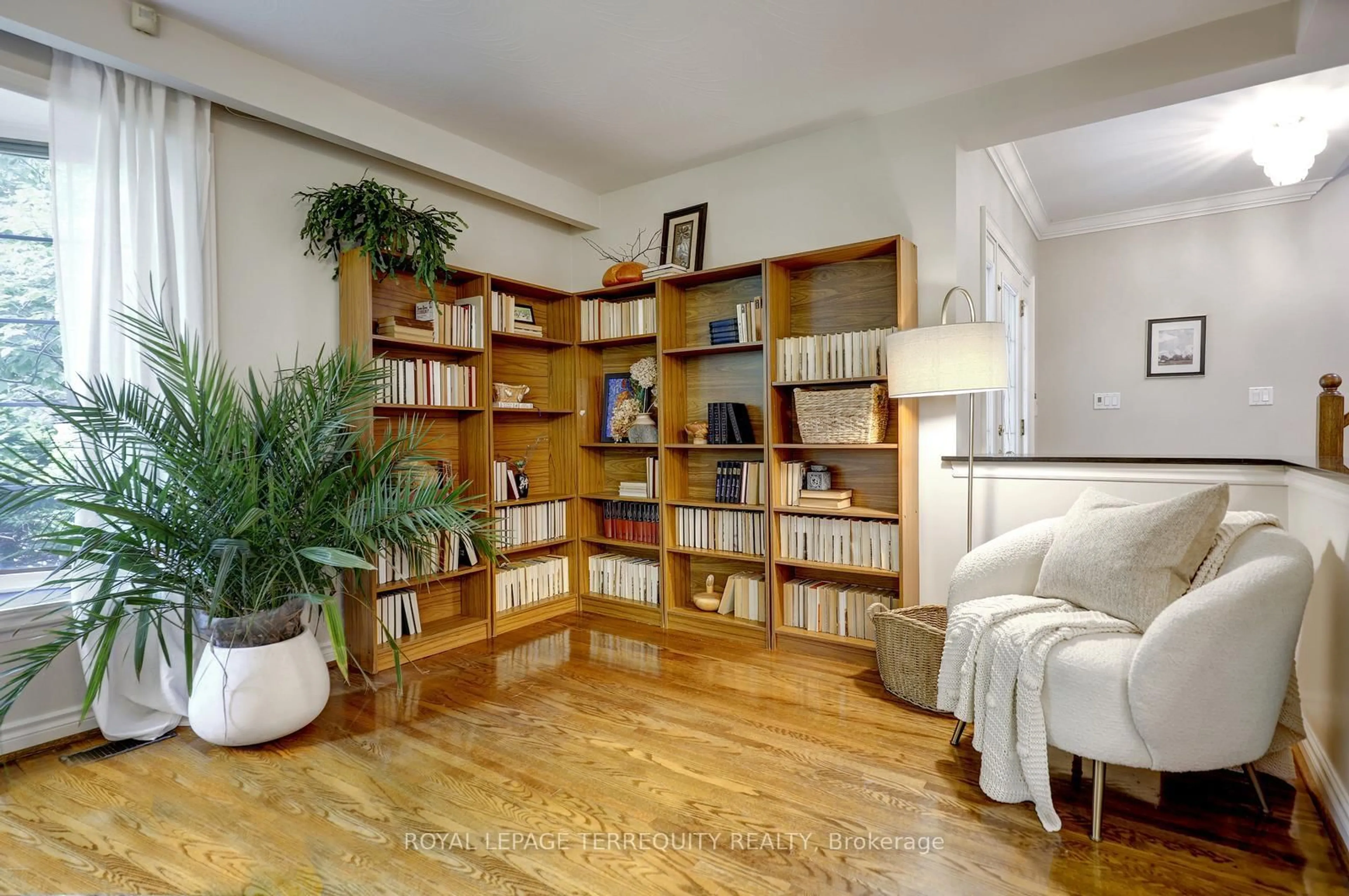 Living room with furniture, wood/laminate floor for 27 Shadwick Dr, Toronto Ontario M9R 2V6