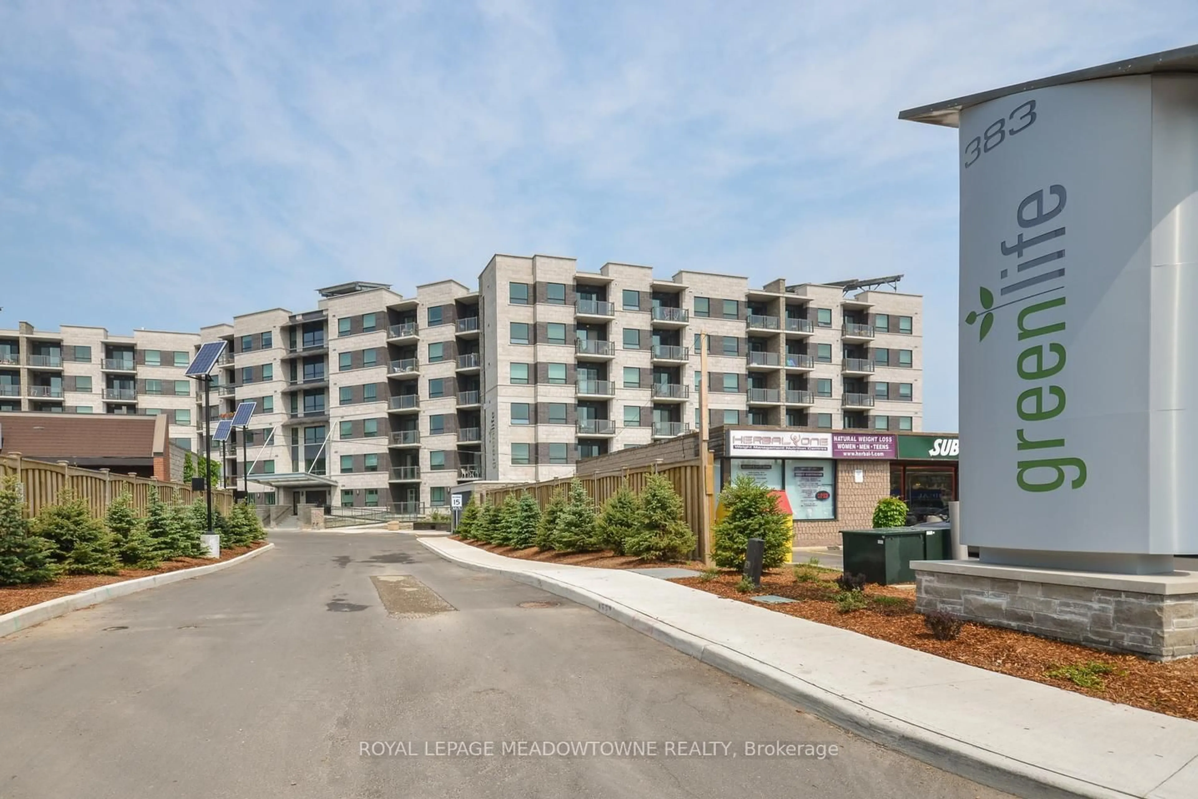 A pic from outside/outdoor area/front of a property/back of a property/a pic from drone, unknown for 383 Main St #308, Milton Ontario L9T 8K8