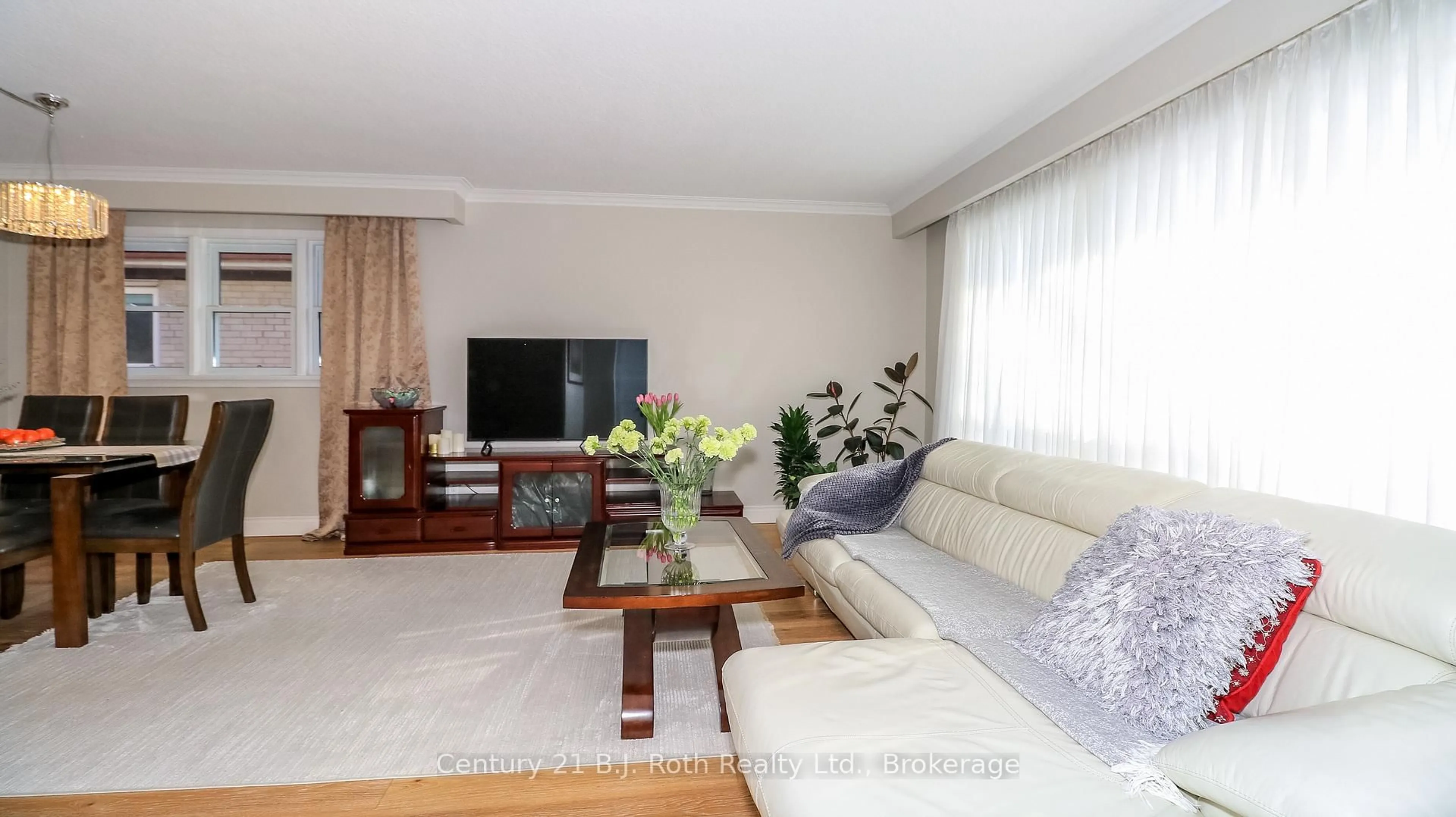 Living room with furniture, wood/laminate floor for 156 The Westway, Toronto Ontario M9P 2C1