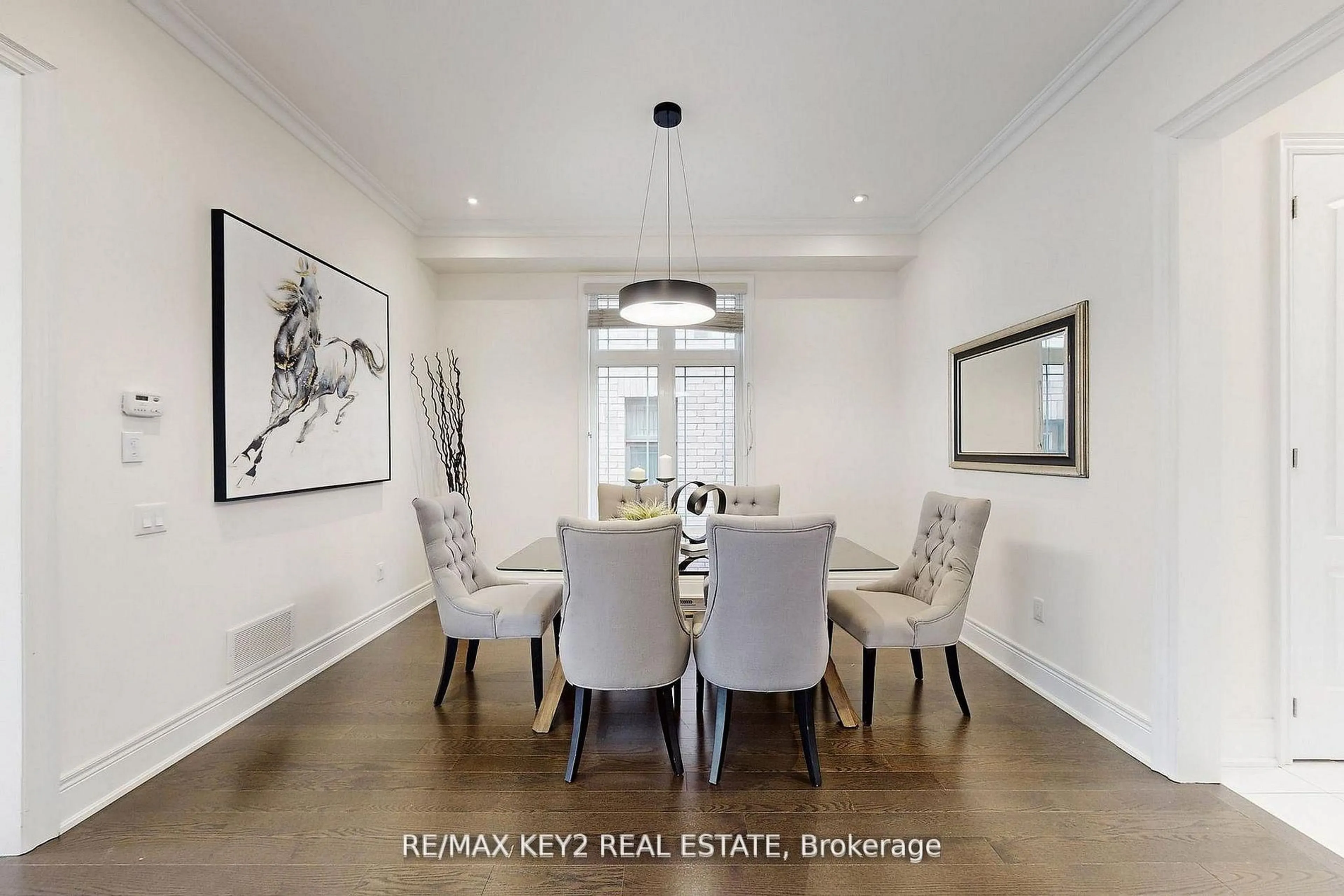Dining room, wood/laminate floor for 10 Lyle Way, Brampton Ontario L6X 5P8