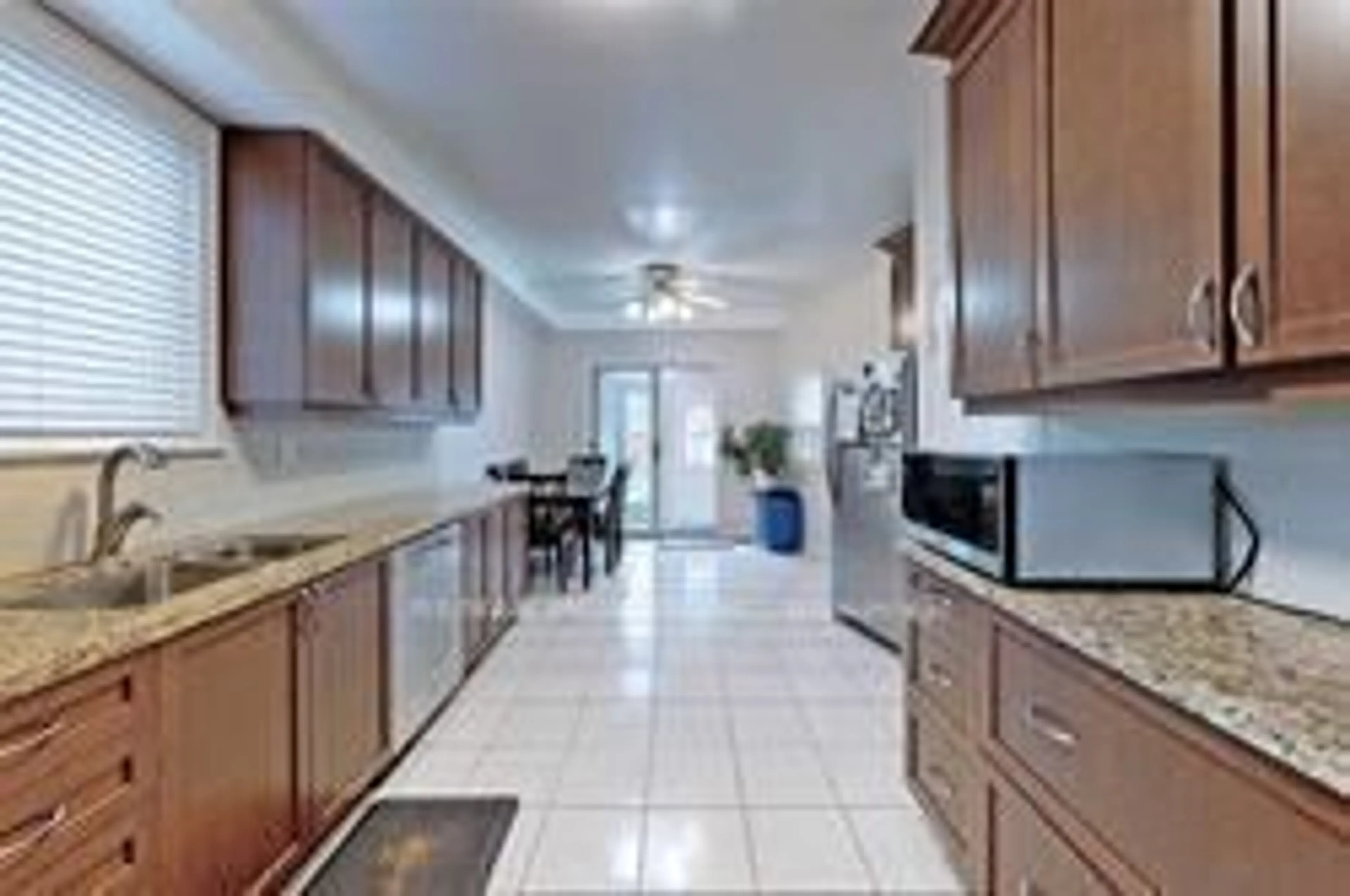 Open concept kitchen, ceramic/tile floor for 221 Belgravia Ave, Toronto Ontario M6E 2M9