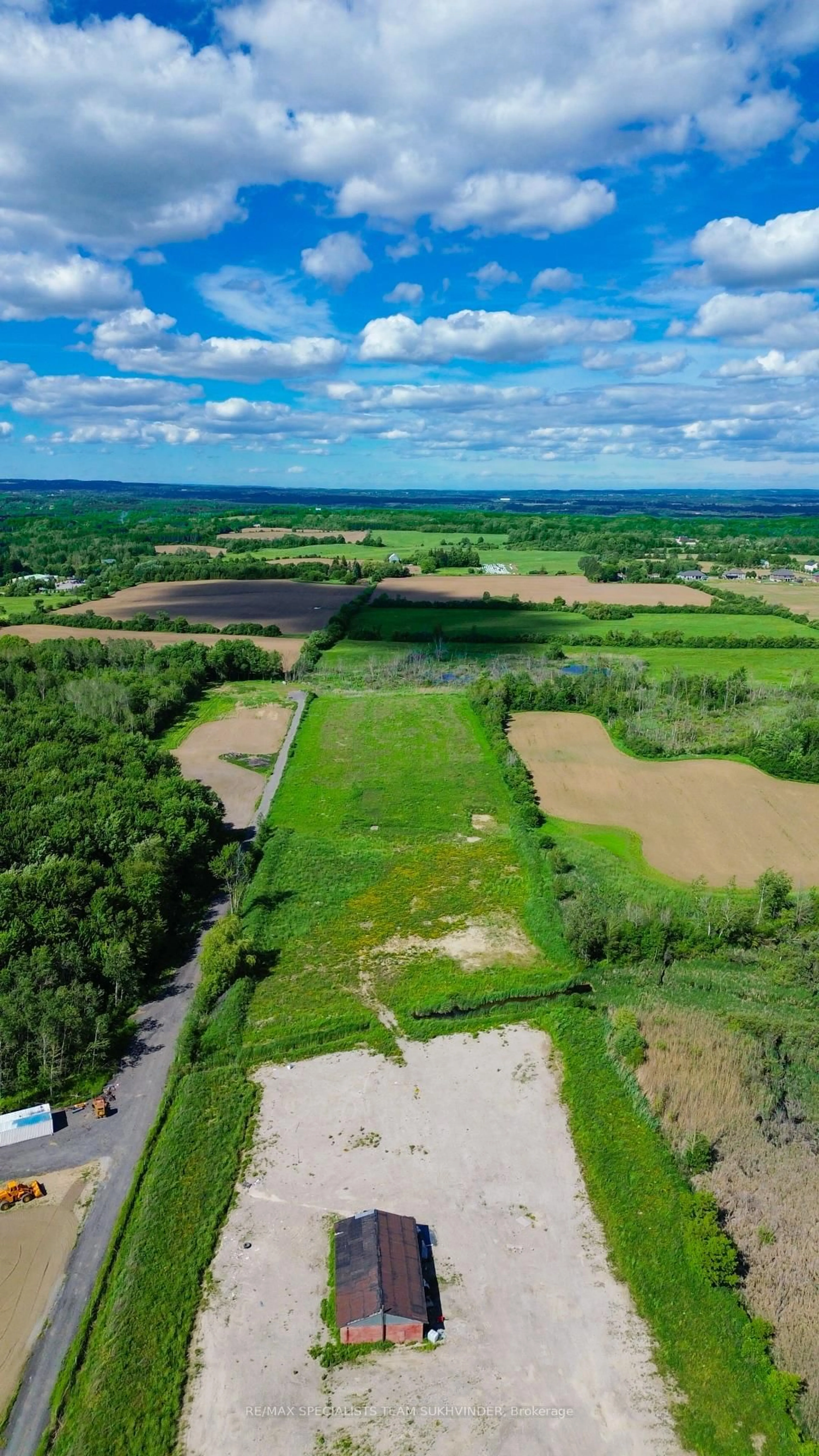 A pic from outside/outdoor area/front of a property/back of a property/a pic from drone, water/lake/river/ocean view for 15245 Airport Rd, Caledon Ontario L7C 2X9