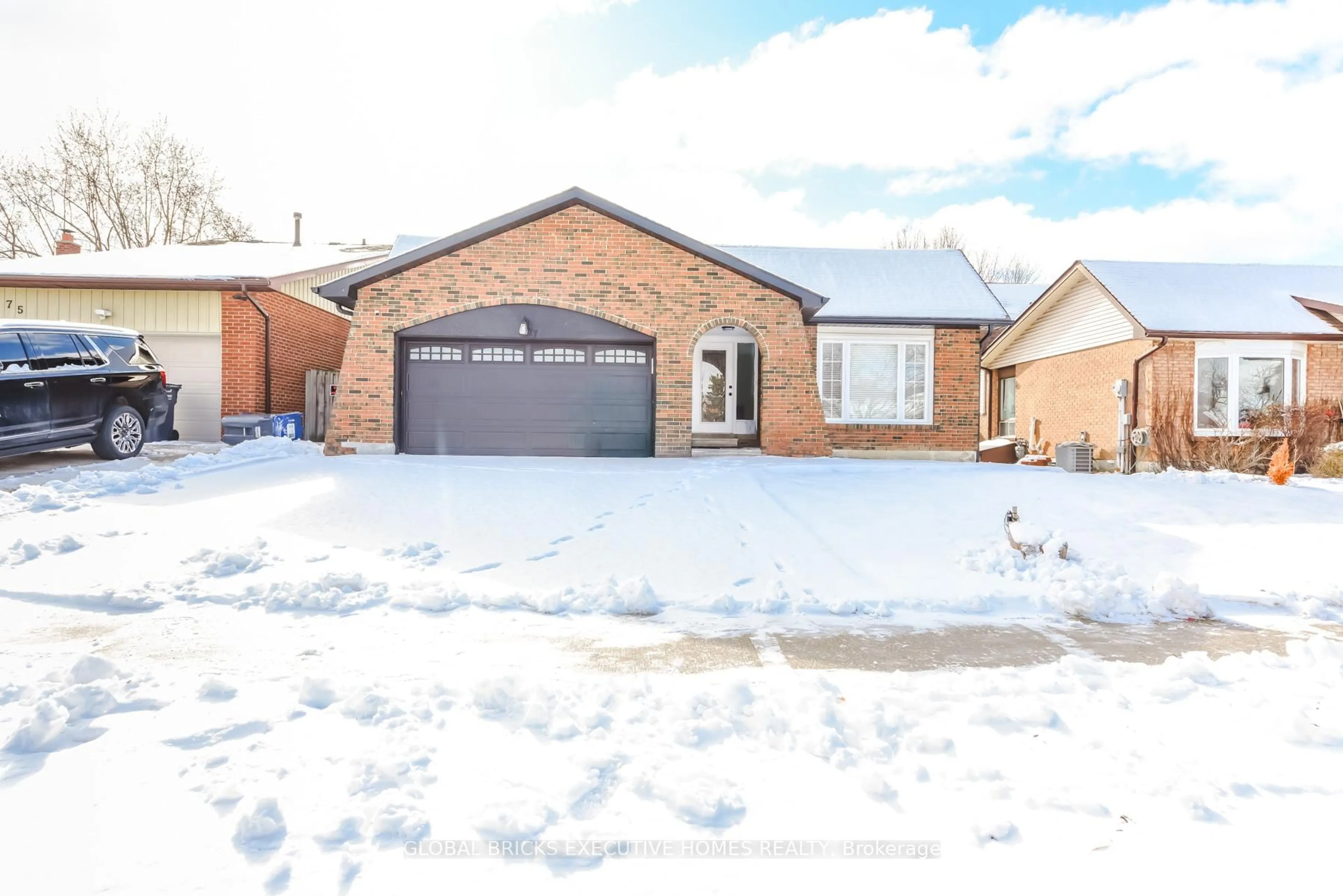 Home with brick exterior material, street for 77 Blackthorn Lane, Brampton Ontario L6V 3L1
