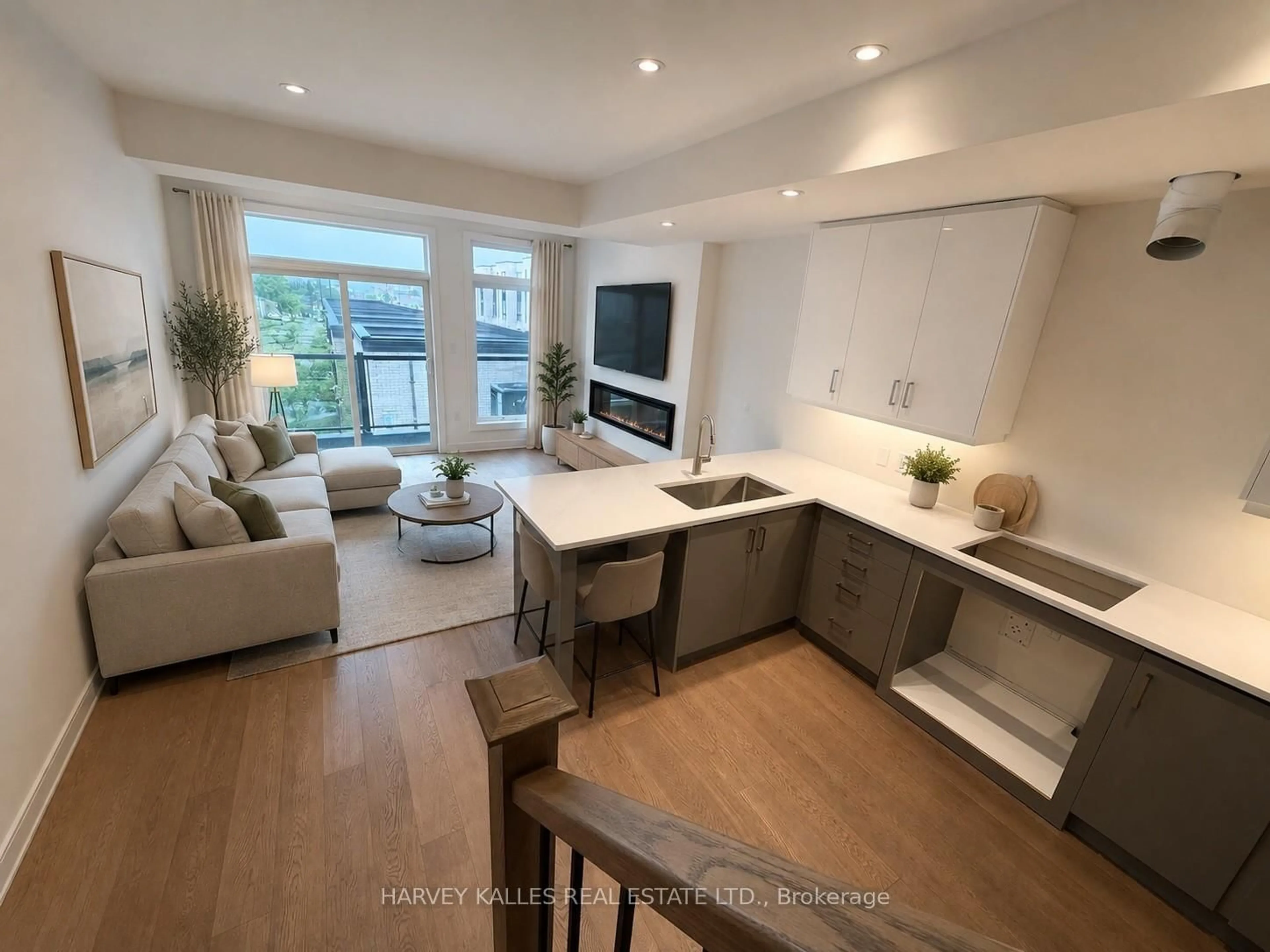 Living room with furniture, wood/laminate floor for 19 Innes Ave, Toronto Ontario M6E 0B2