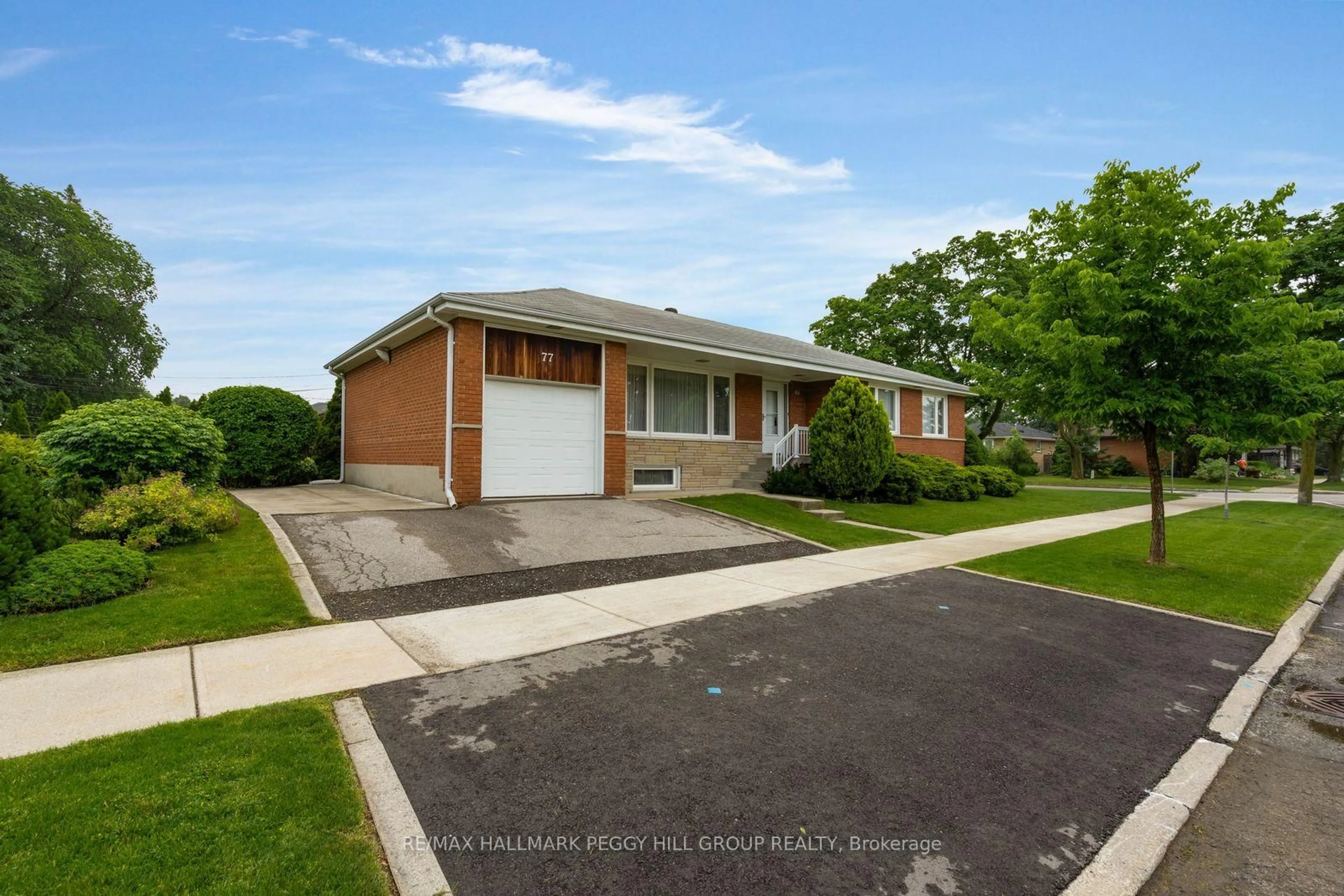 Home with brick exterior material, street for 77 Stapleton Dr, Toronto Ontario M9R 2Z8