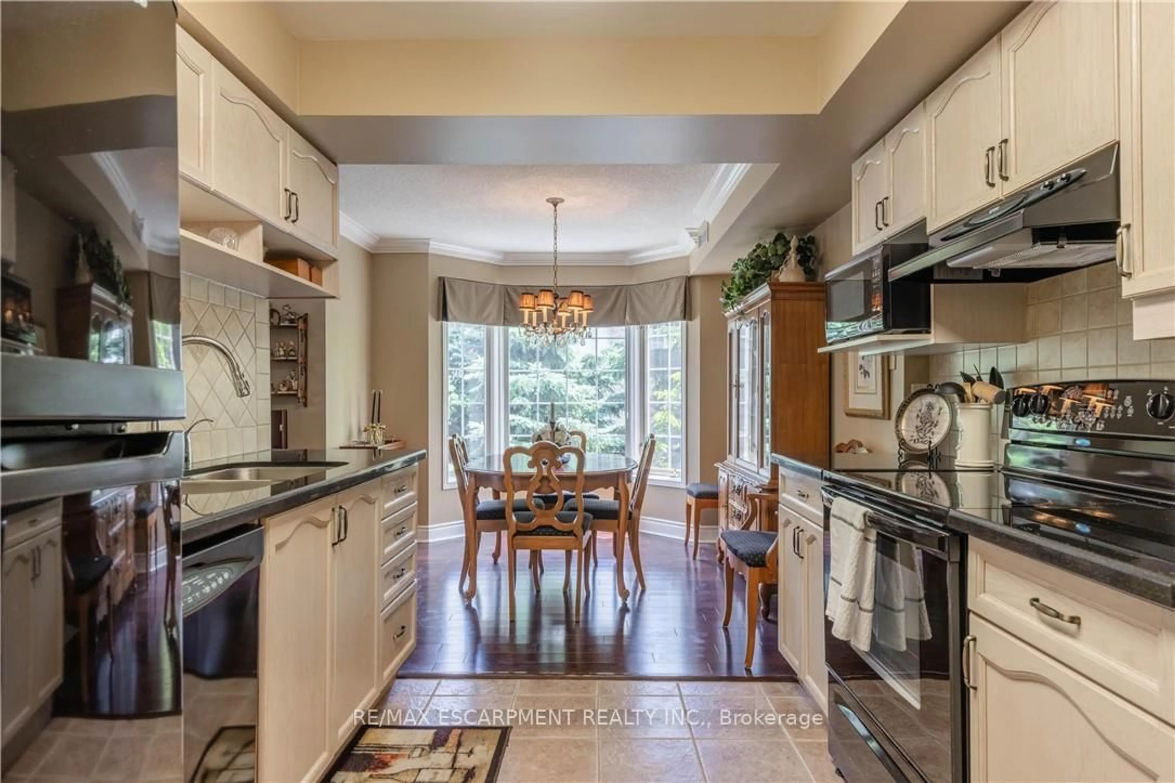 Open concept kitchen, ceramic/tile floor for 216 Plains Rd #D301, Burlington Ontario L7T 4L2