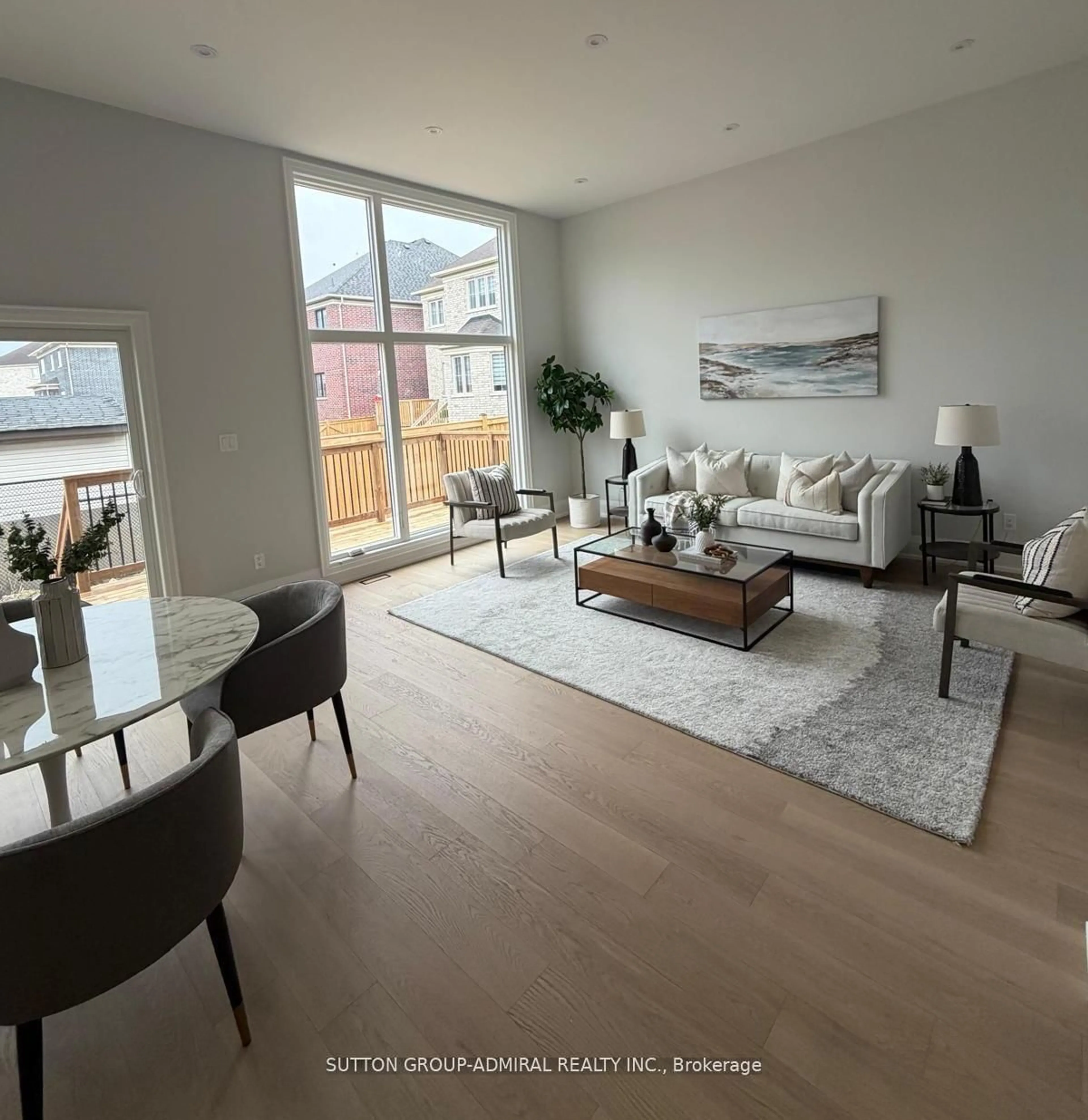 Living room with furniture, wood/laminate floor for 24 Valleywest Rd, Brampton Ontario L6P 2J9