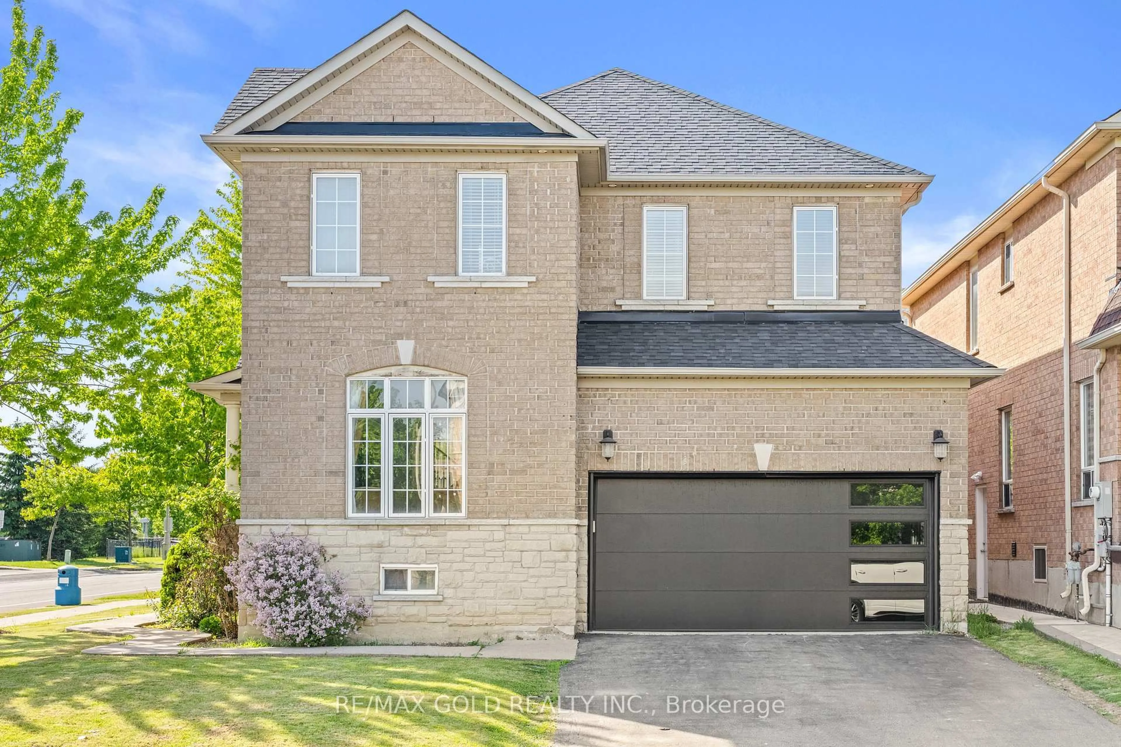 Home with brick exterior material, street for 261 Mountainash Rd, Brampton Ontario L6R 3M3