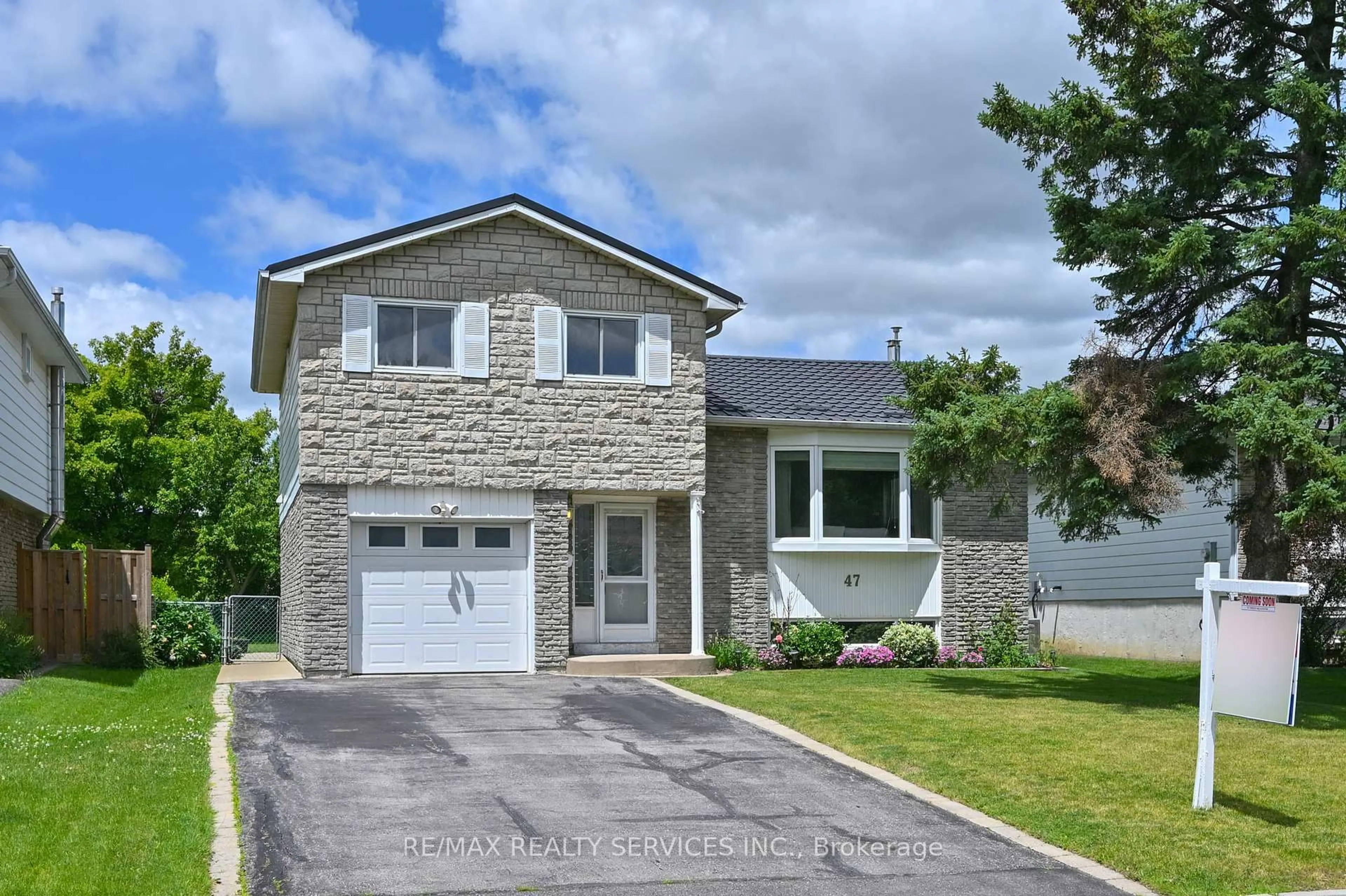 Home with brick exterior material, street for 47 Grassington Cres, Brampton Ontario L6S 1Z5