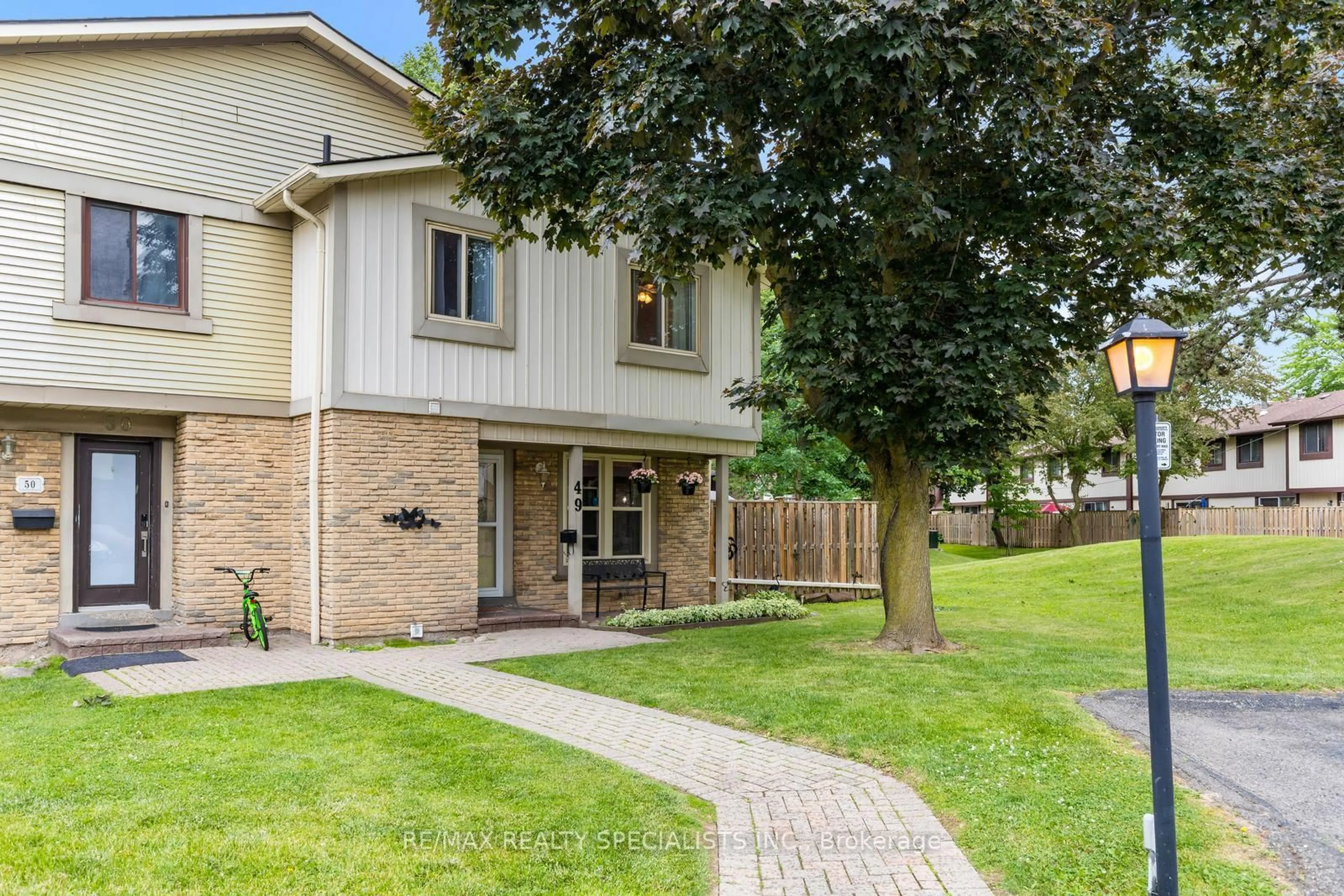 Home with brick exterior material, street for 6650 Falconer Dr #49, Mississauga Ontario L5N 1B5