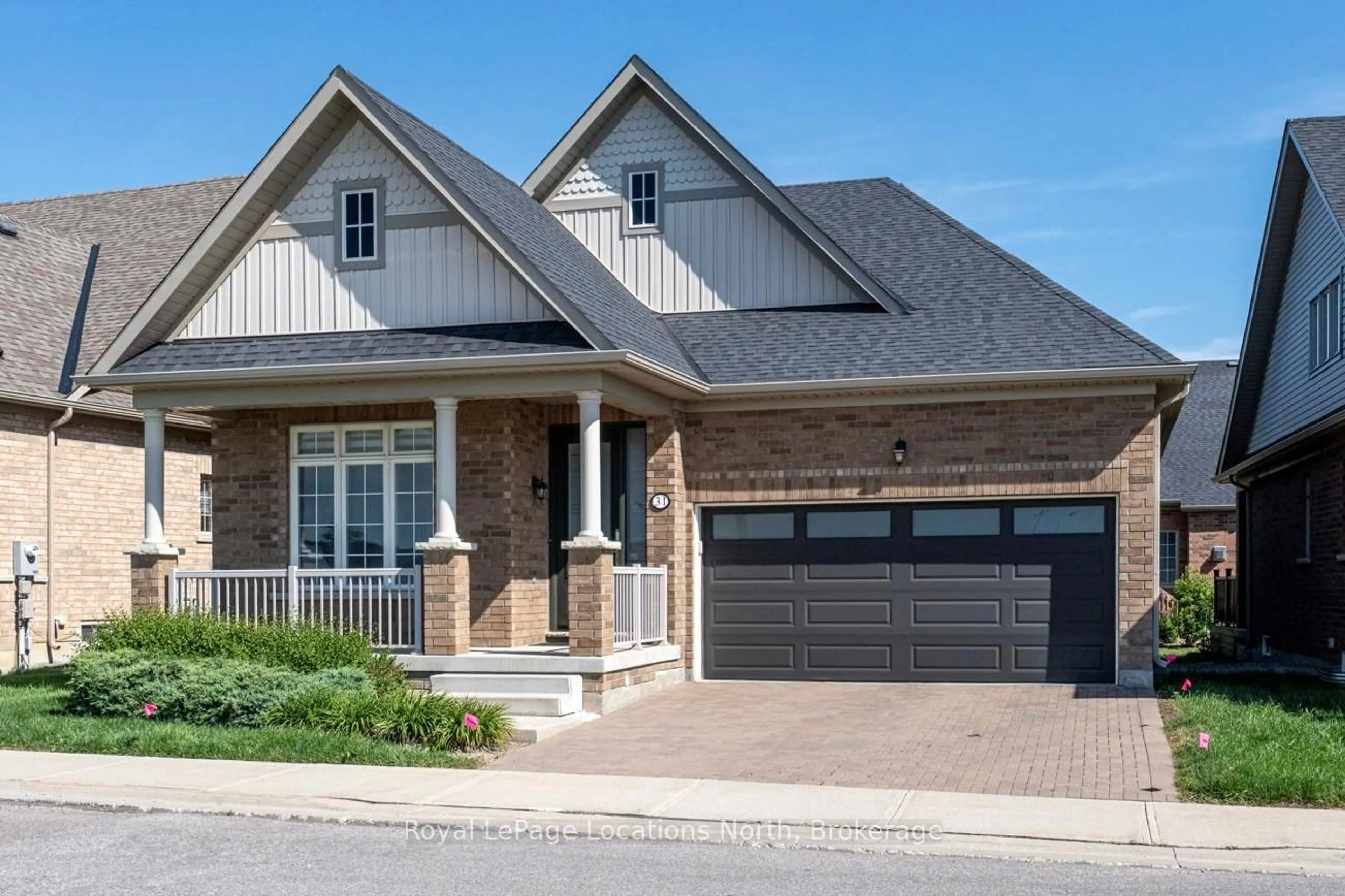 Home with brick exterior material, street for 31 Tea Rose Rd, Brampton Ontario L6R 0W2