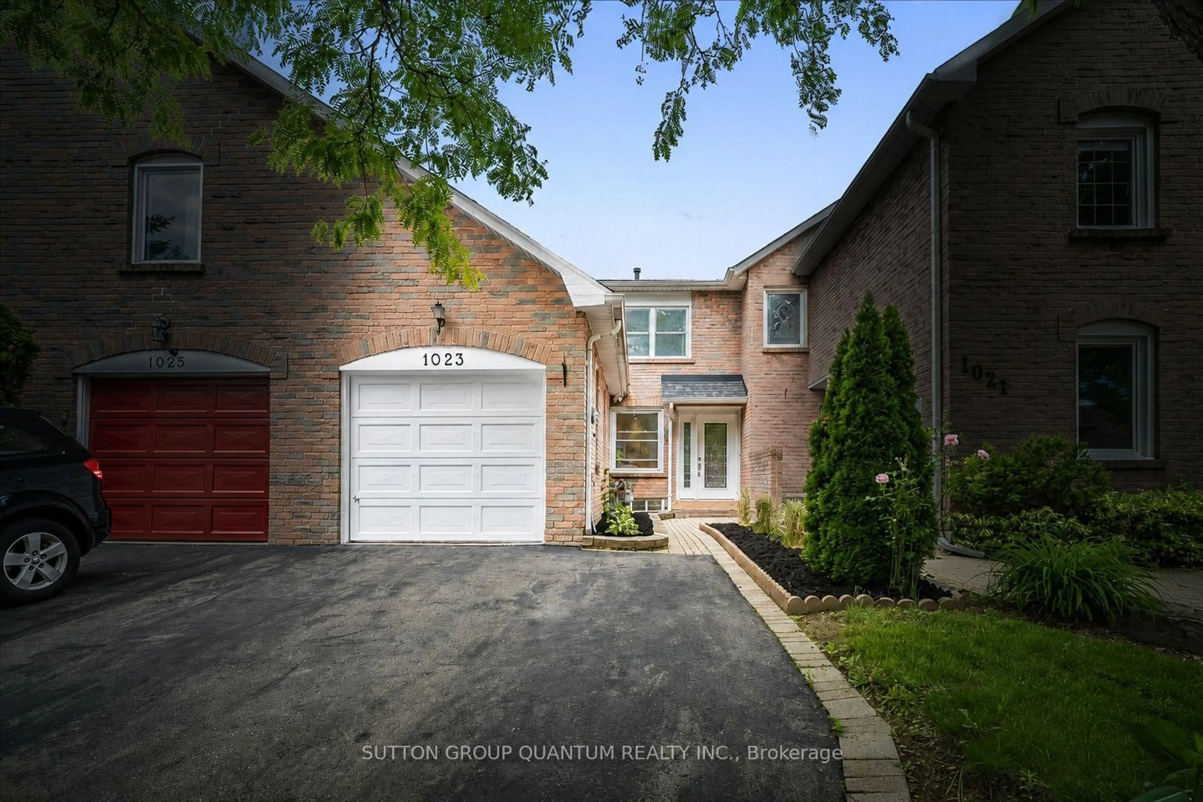 Home with brick exterior material, street for 1023 Runnymead Cres, Oakville Ontario L6M 1C5