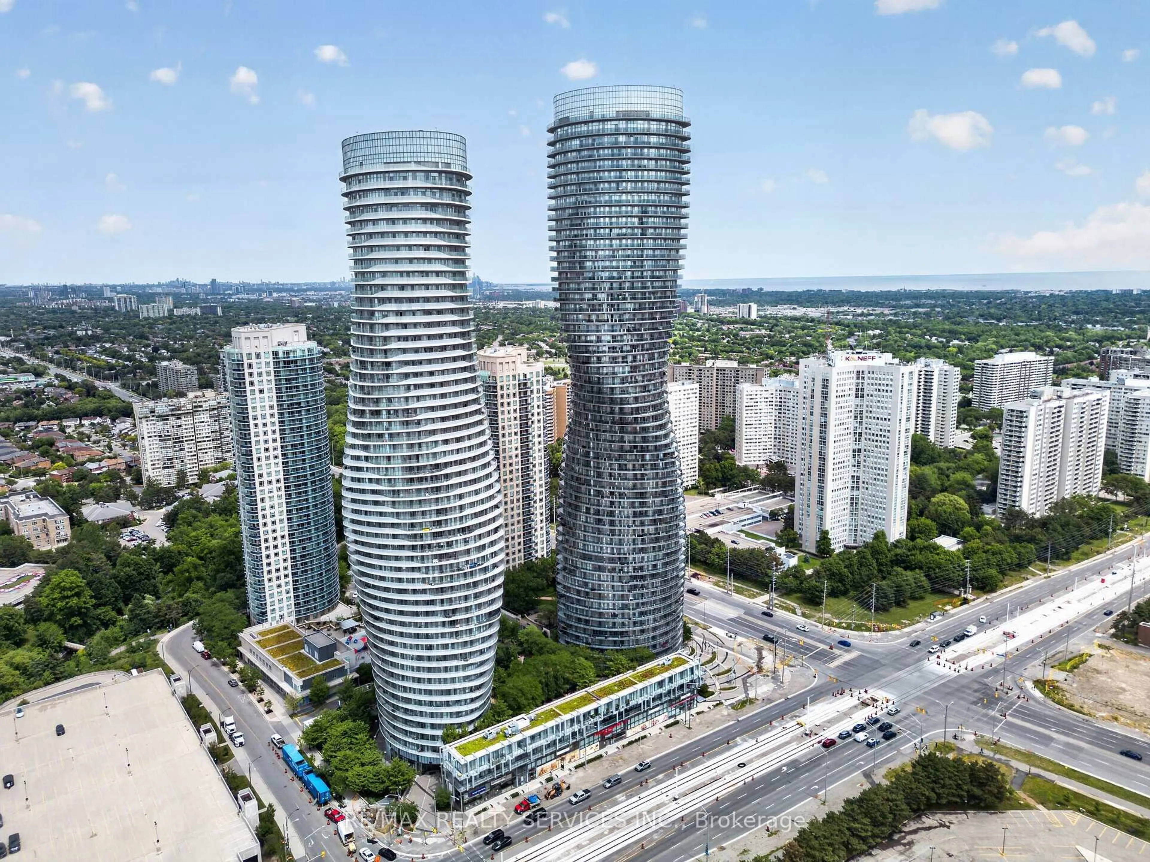 A pic from outside/outdoor area/front of a property/back of a property/a pic from drone, city buildings view from balcony for 60 Absolute Ave #4403, Mississauga Ontario L4Z 0A9