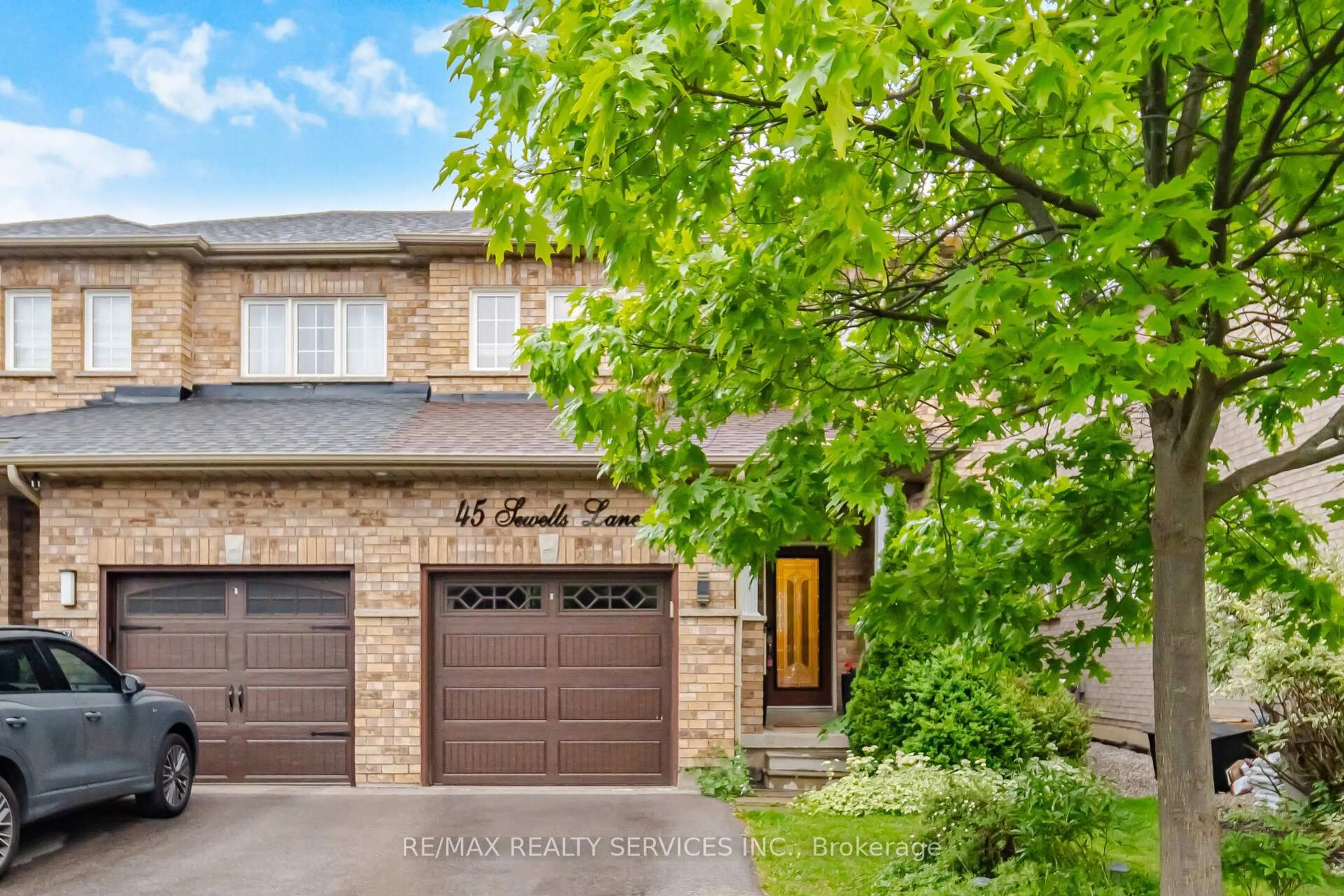 Home with brick exterior material, street for 45 Sewells Lane, Brampton Ontario L7A 2Z9