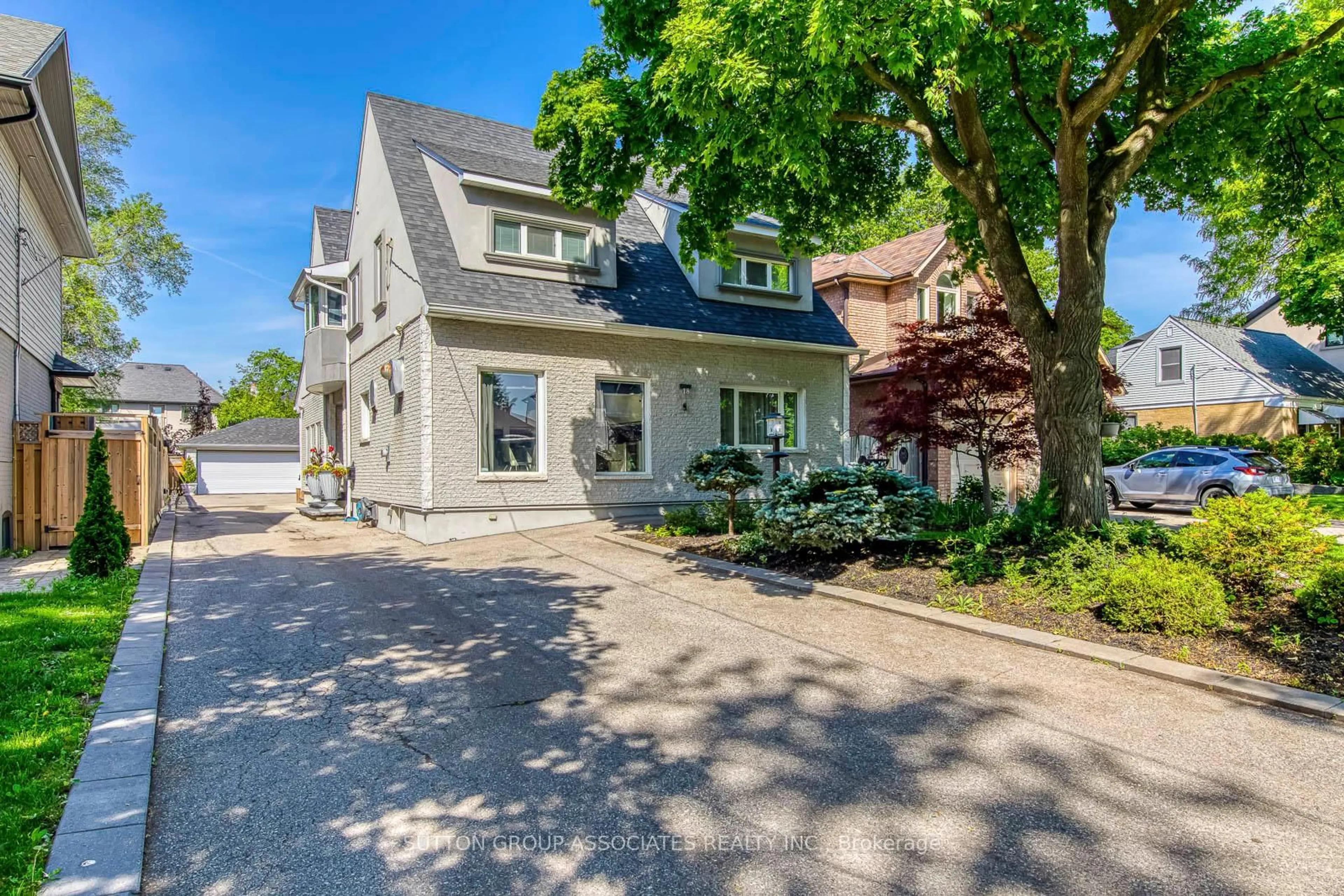 Home with brick exterior material, street for 18 Martin Grove Rd, Toronto Ontario M9B 4J9