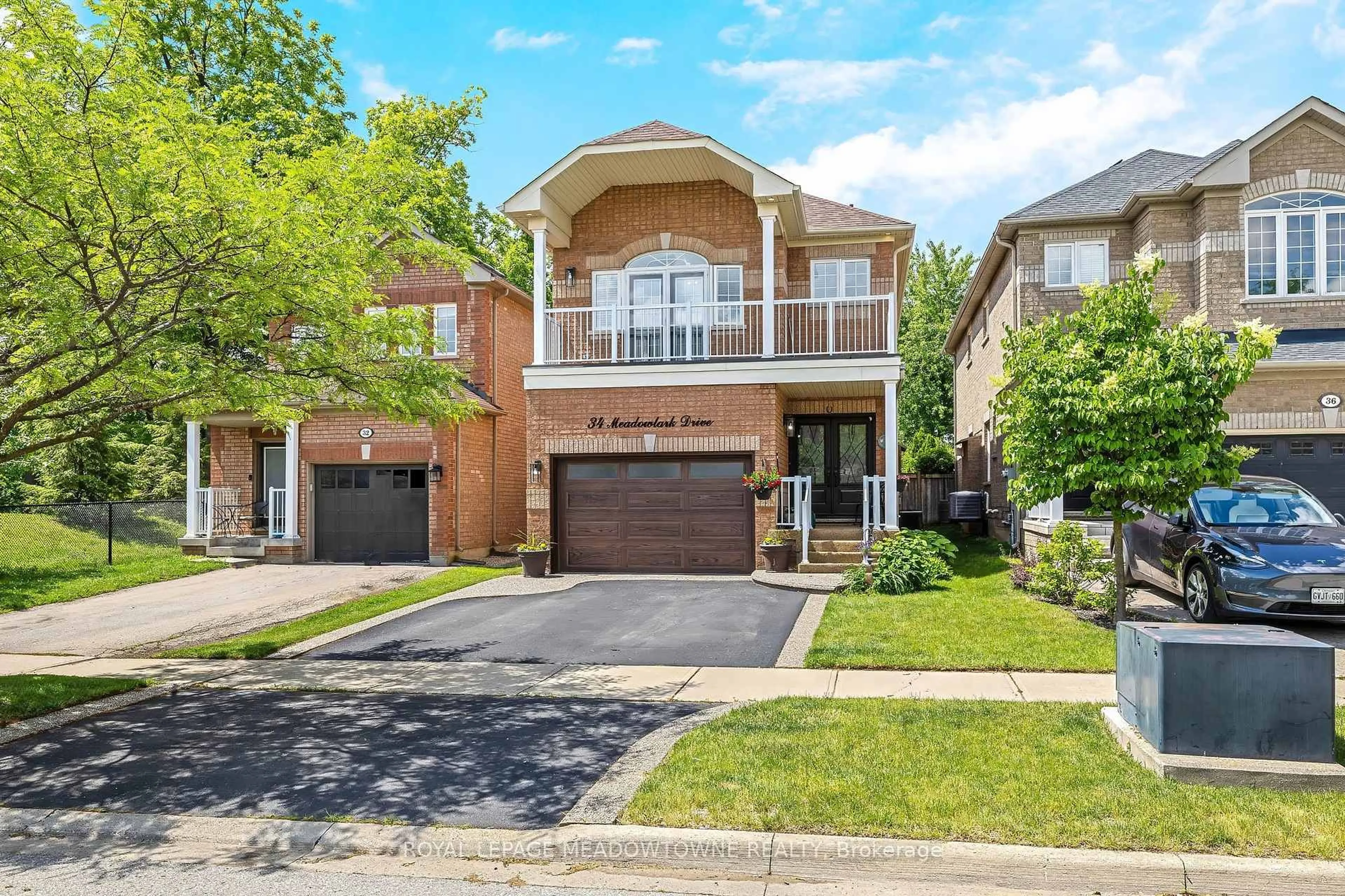 Home with brick exterior material, street for 34 Meadowlark Dr, Halton Hills Ontario L7G 6N2
