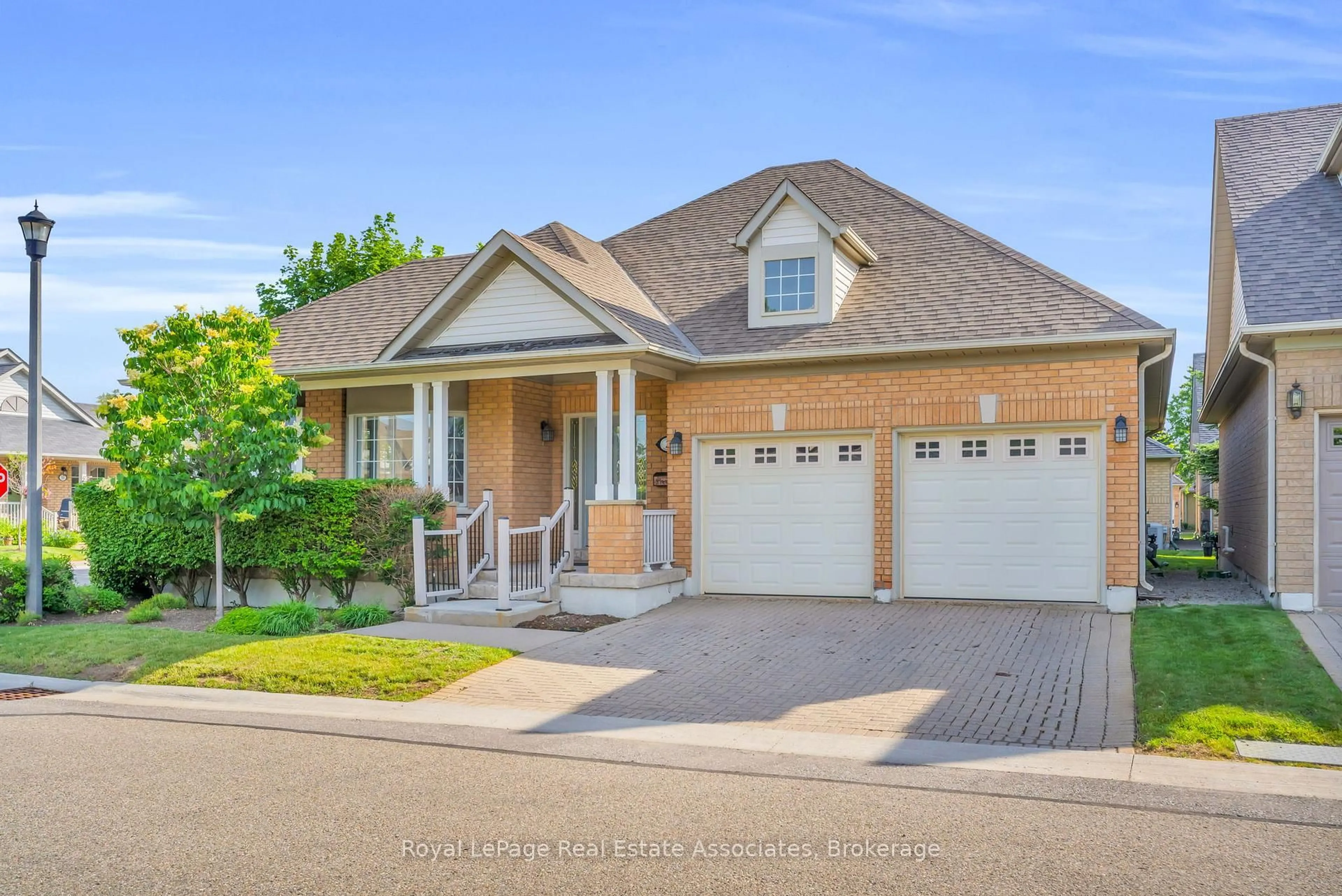 Home with brick exterior material, street for 2 Larkdale Terr #12, Brampton Ontario L6R 1W5