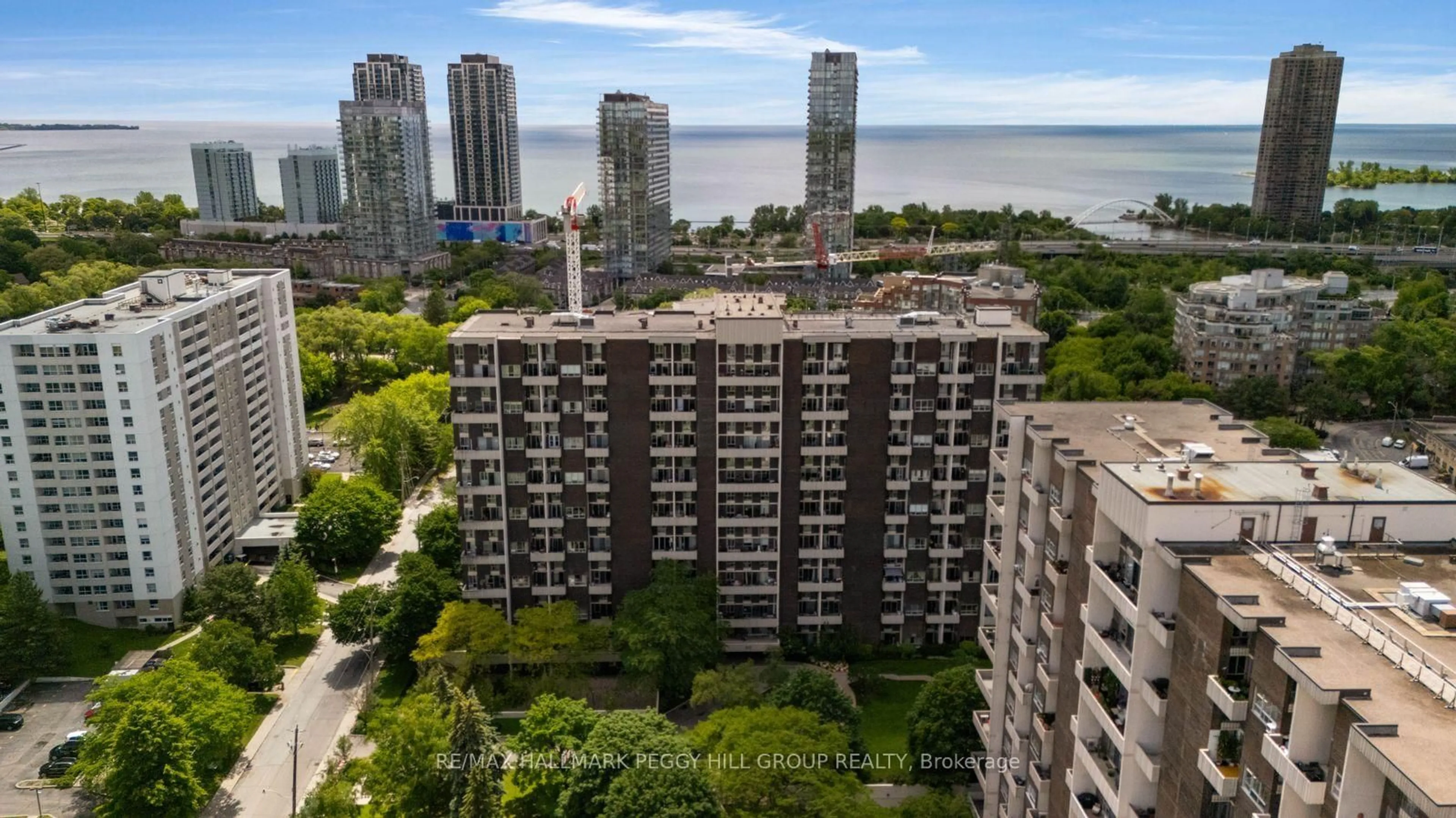 A pic from outside/outdoor area/front of a property/back of a property/a pic from drone, city buildings view from balcony for 60 Southport St #306, Toronto Ontario M6S 3N4