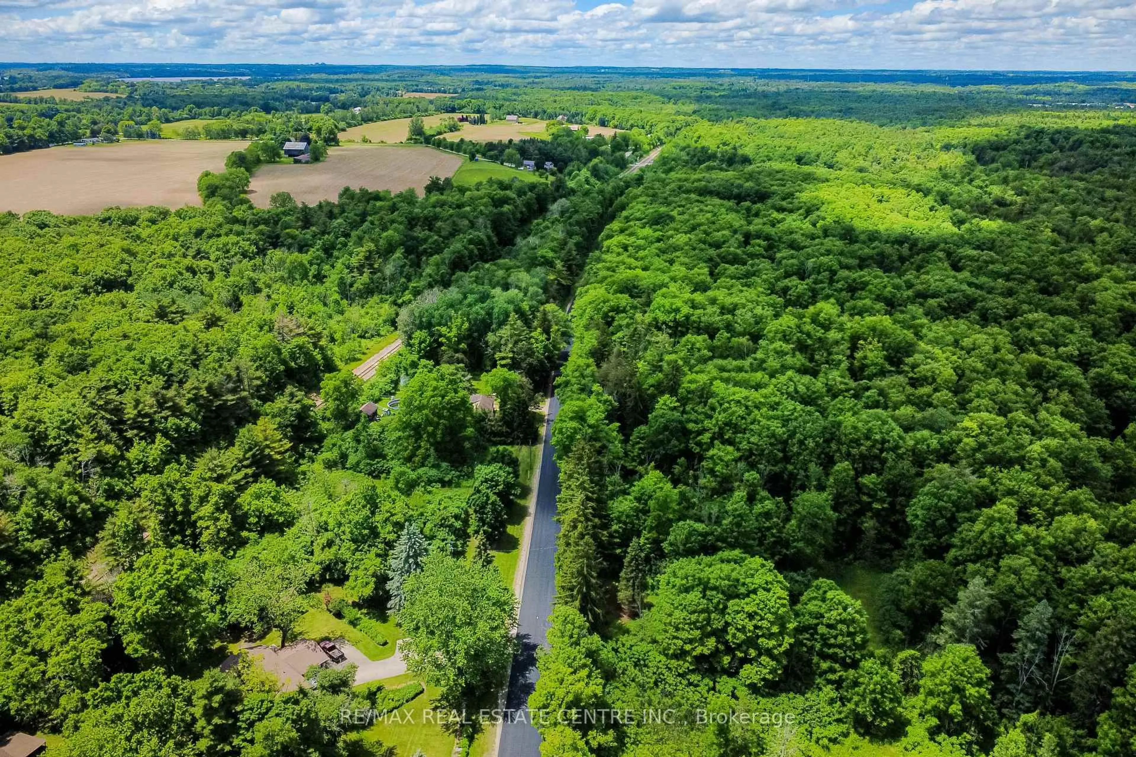 A pic from outside/outdoor area/front of a property/back of a property/a pic from drone, forest/trees view for 8327 First Line, Milton Ontario L0P 1B0