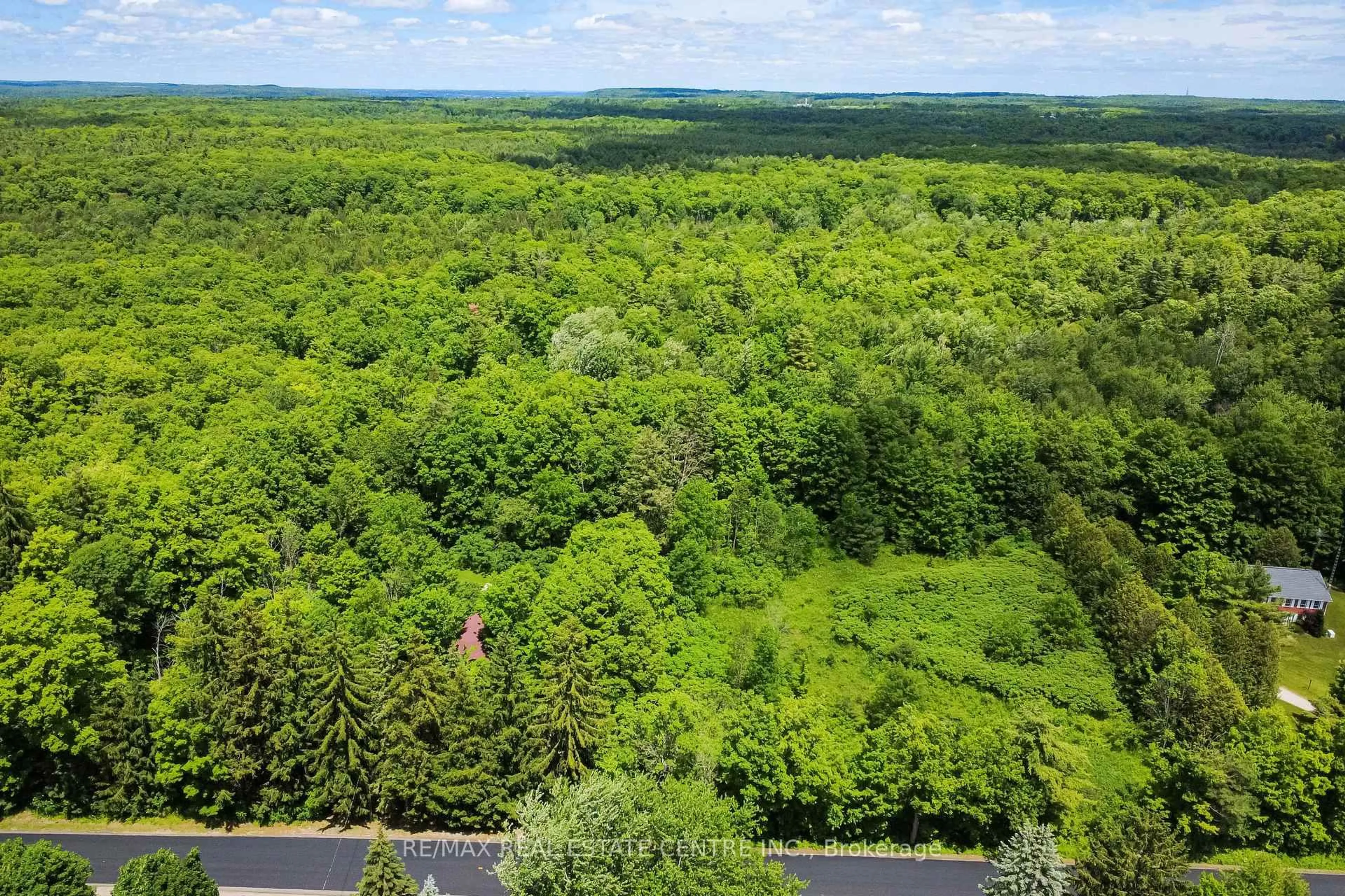 A pic from outside/outdoor area/front of a property/back of a property/a pic from drone, forest/trees view for 8327 First Line, Milton Ontario L0P 1B0