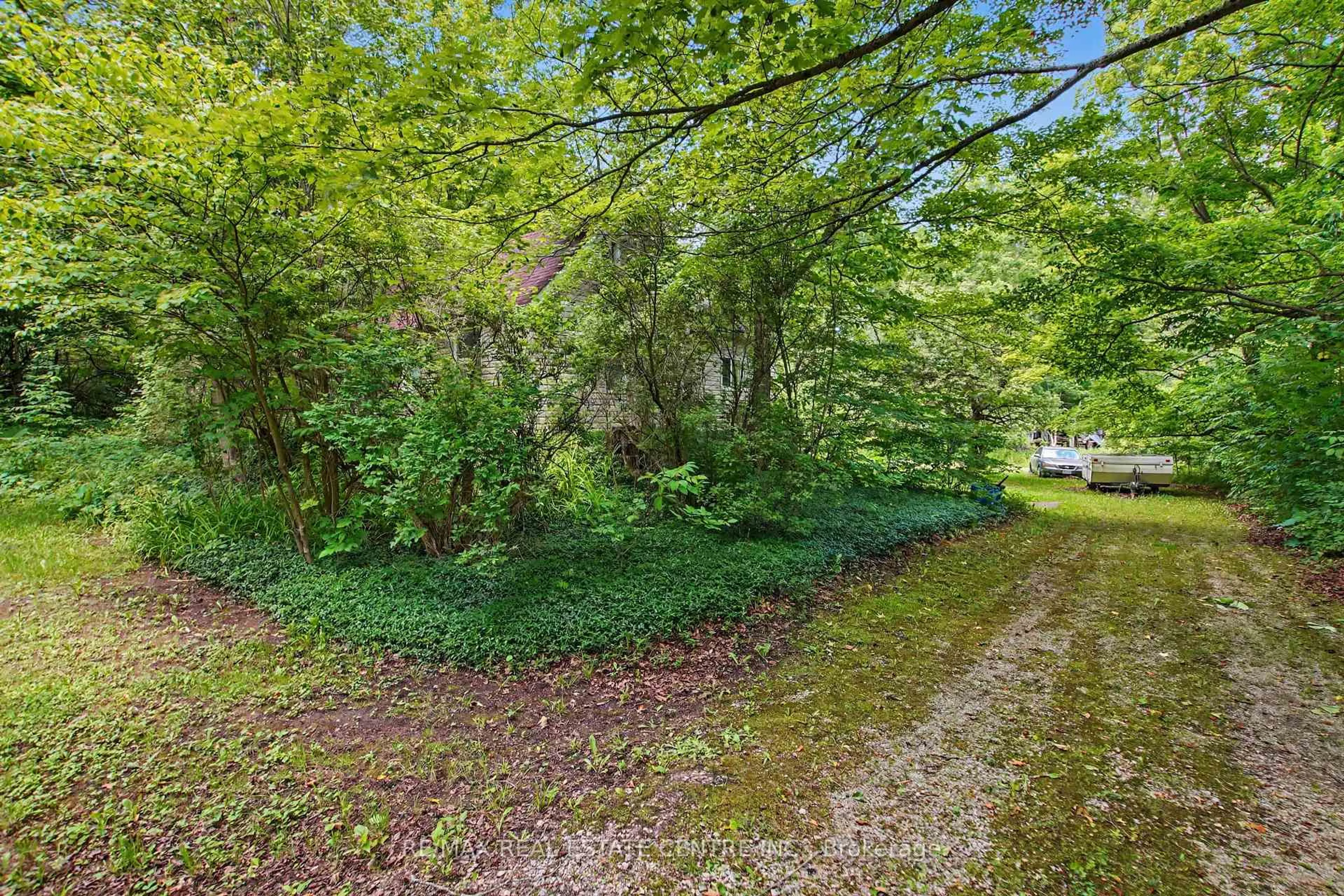 A pic from outside/outdoor area/front of a property/back of a property/a pic from drone, forest/trees view for 8327 First Line, Milton Ontario L0P 1B0