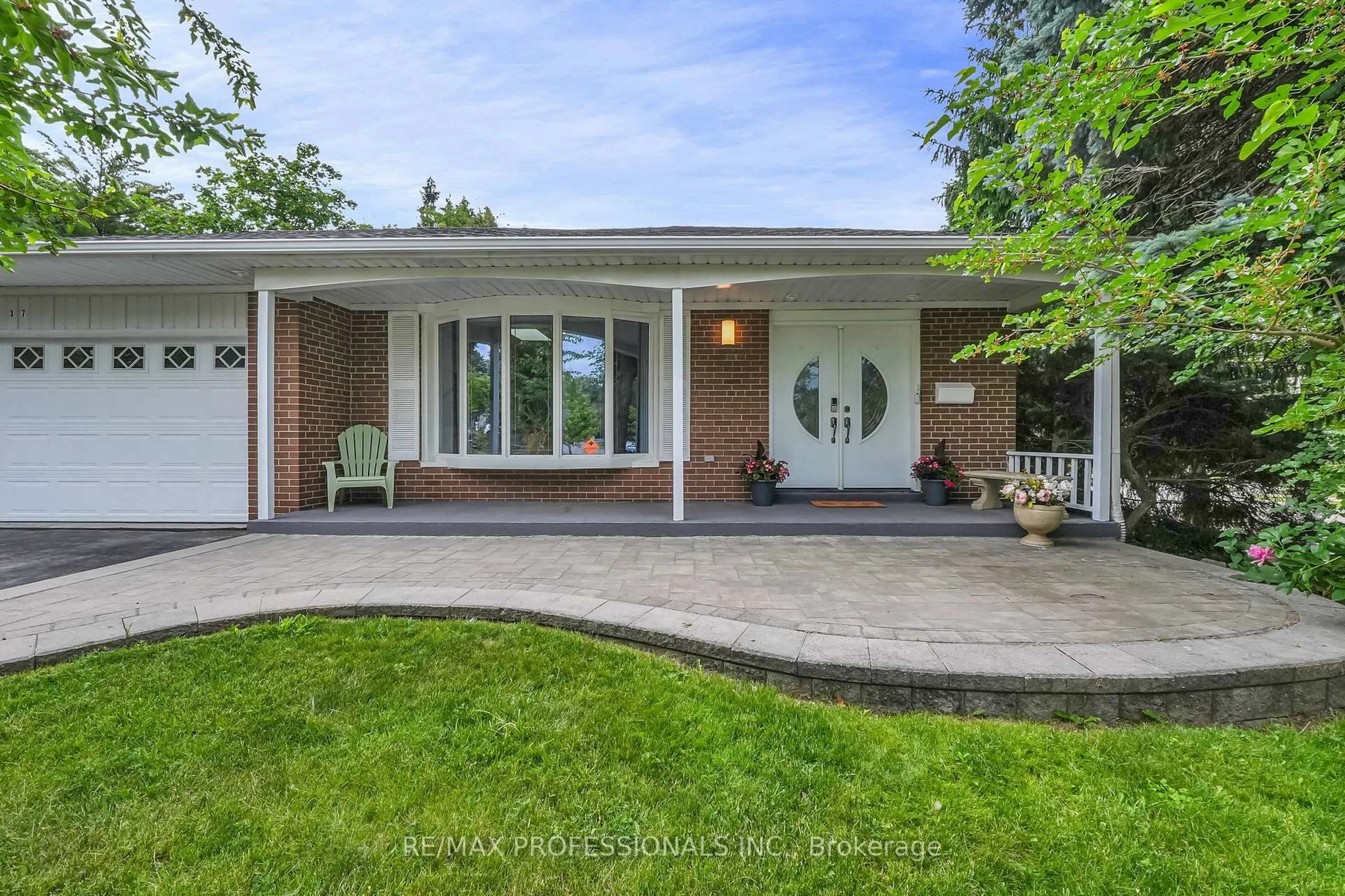 Home with brick exterior material, street for 37 Sunplains Cres, Toronto Ontario M9C 1M4