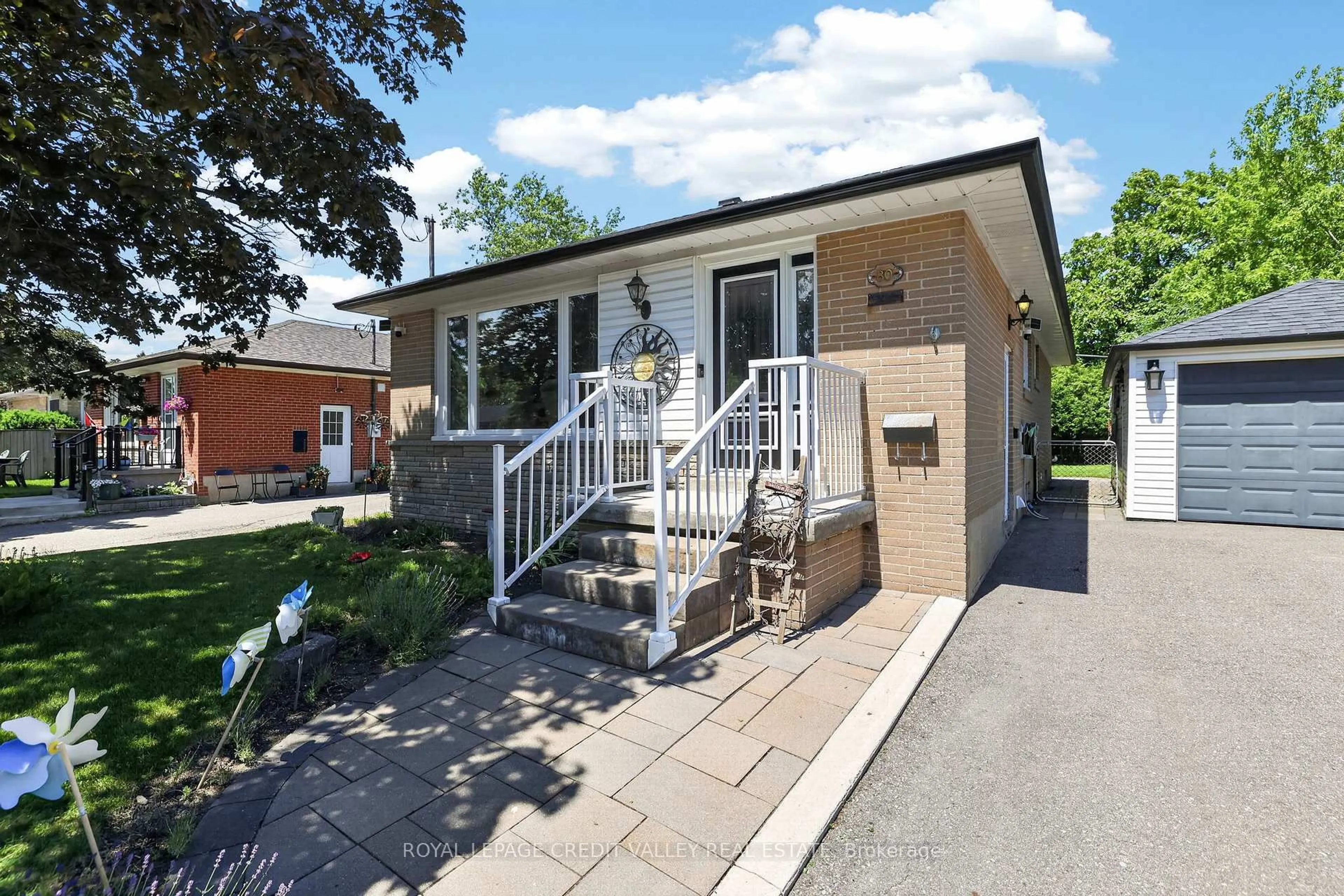 Home with brick exterior material, street for 80 Cornwall Rd, Brampton Ontario L6W 1N3