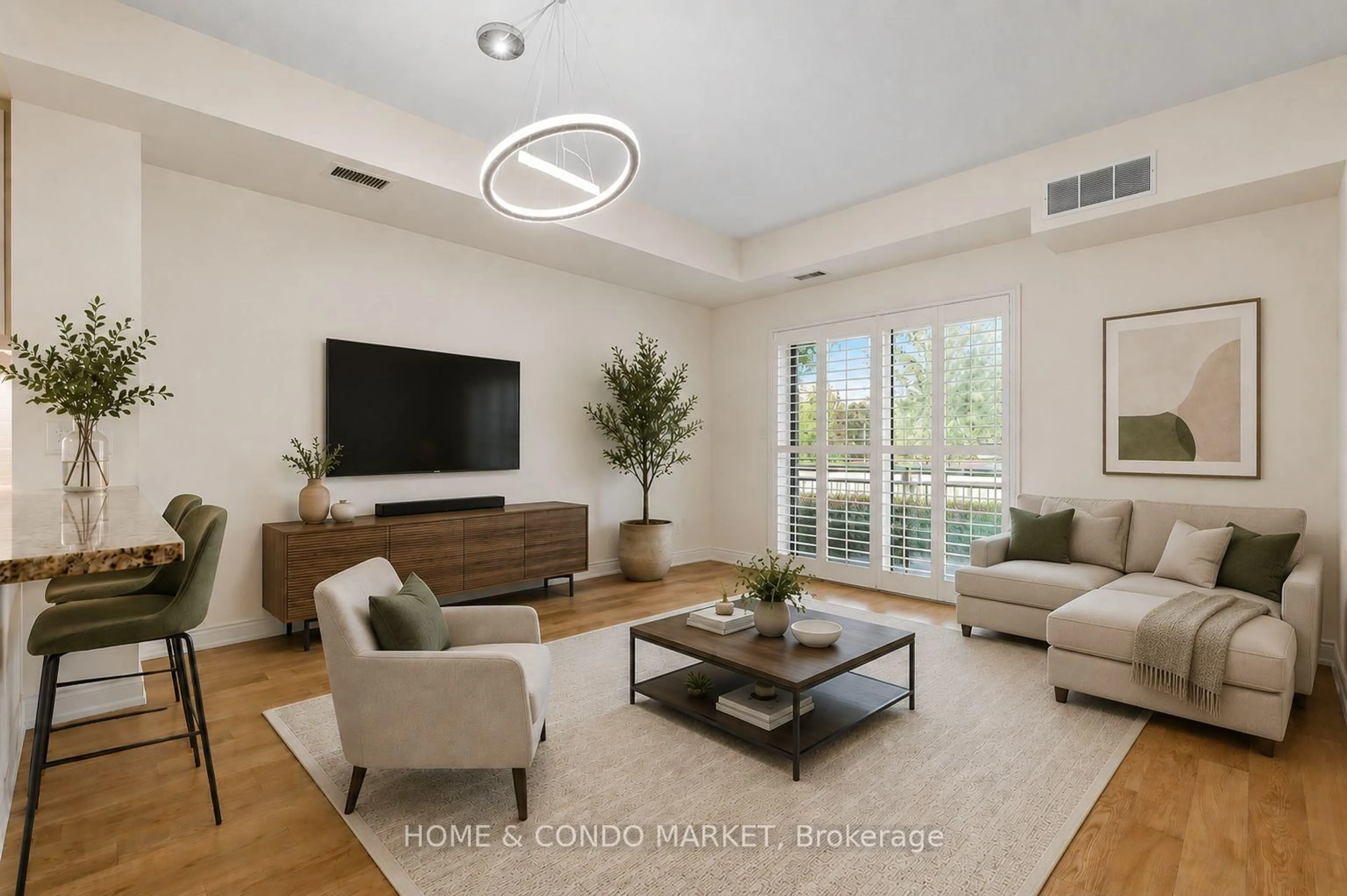 Living room with furniture, unknown for 3170 Erin Mills Pkwy #130, Mississauga Ontario L5L 0B6