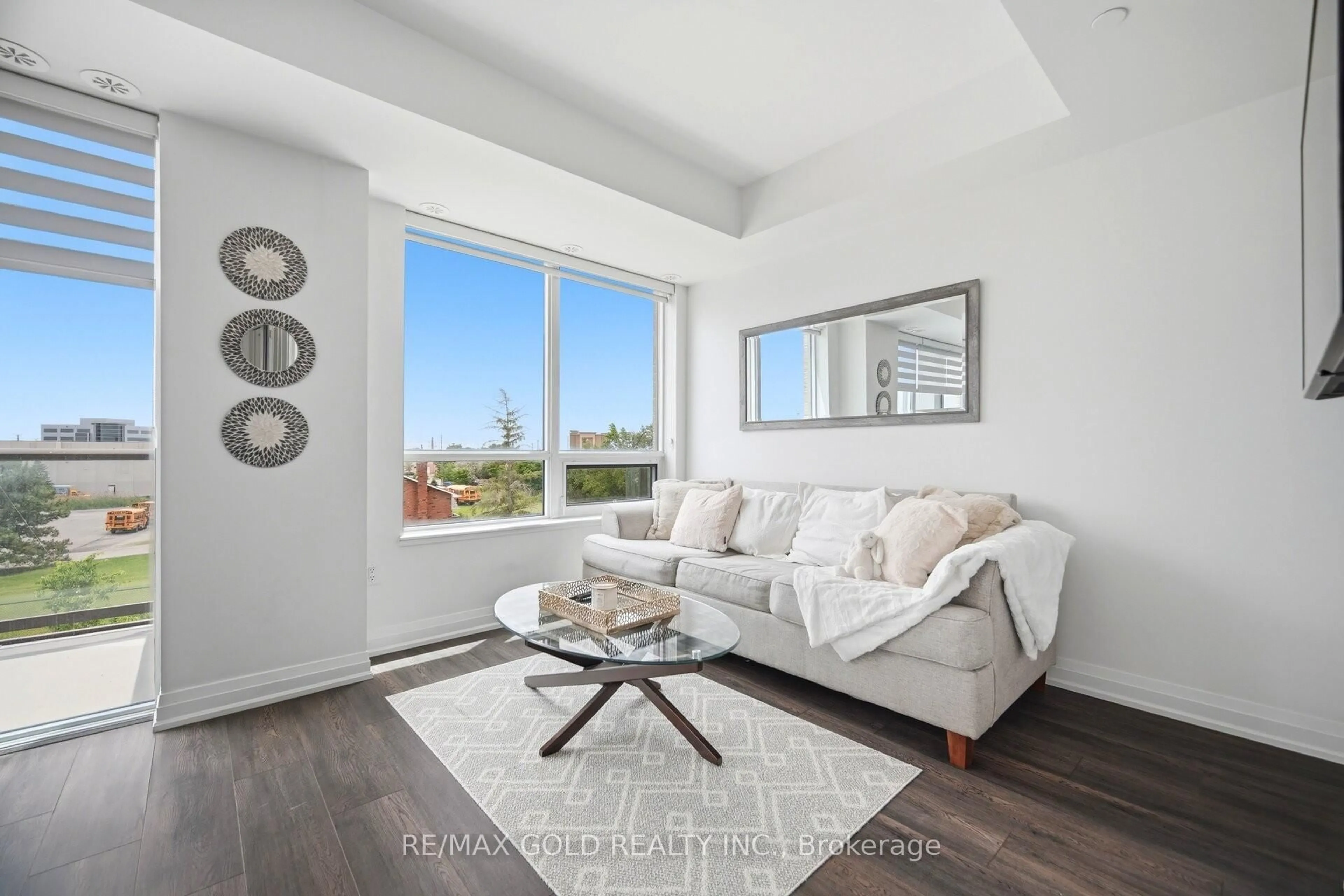 Living room with furniture, unknown for 95 Attmar Dr #307, Brampton Ontario L6P 0Y6