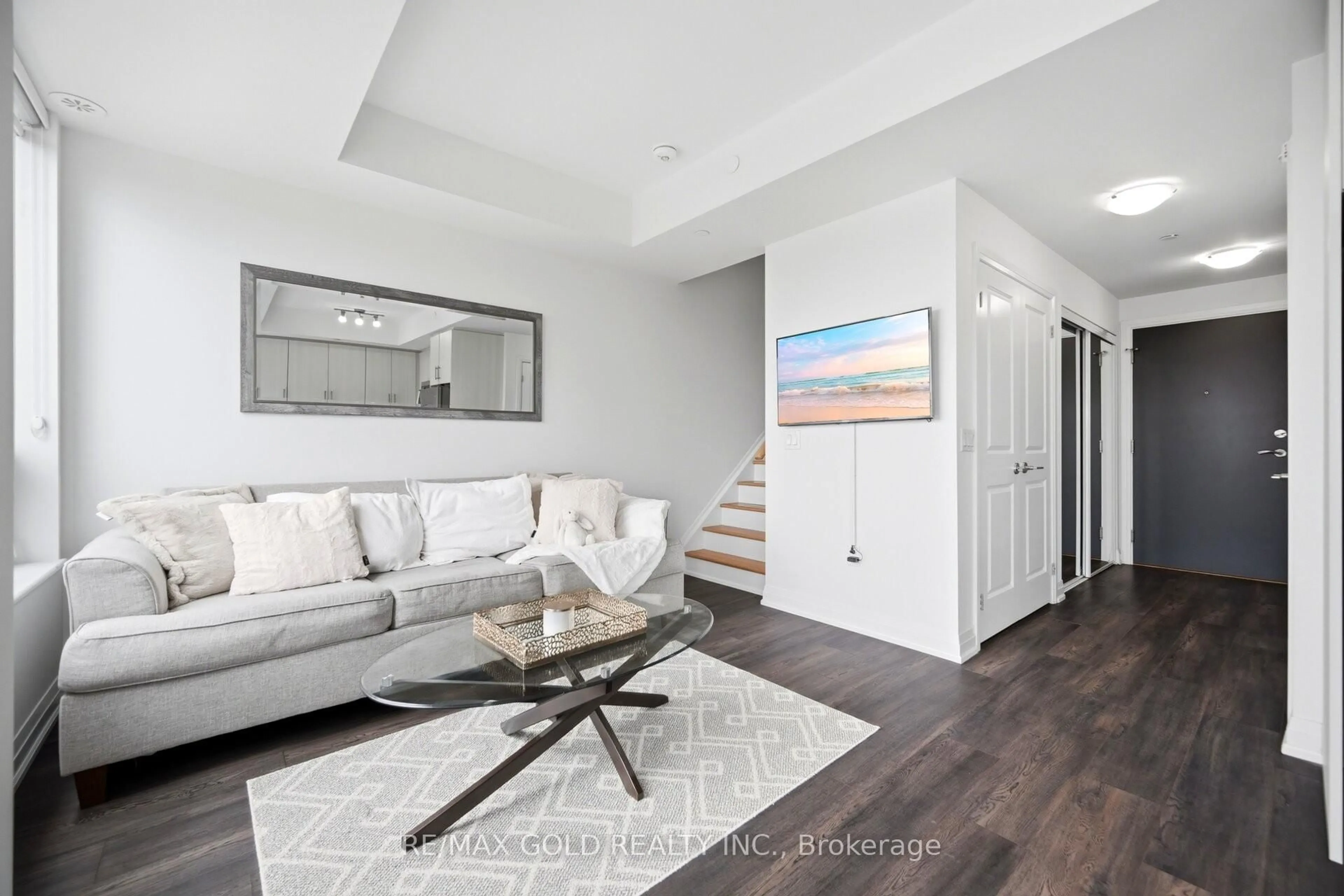 Living room with furniture, unknown for 95 Attmar Dr #307, Brampton Ontario L6P 0Y6