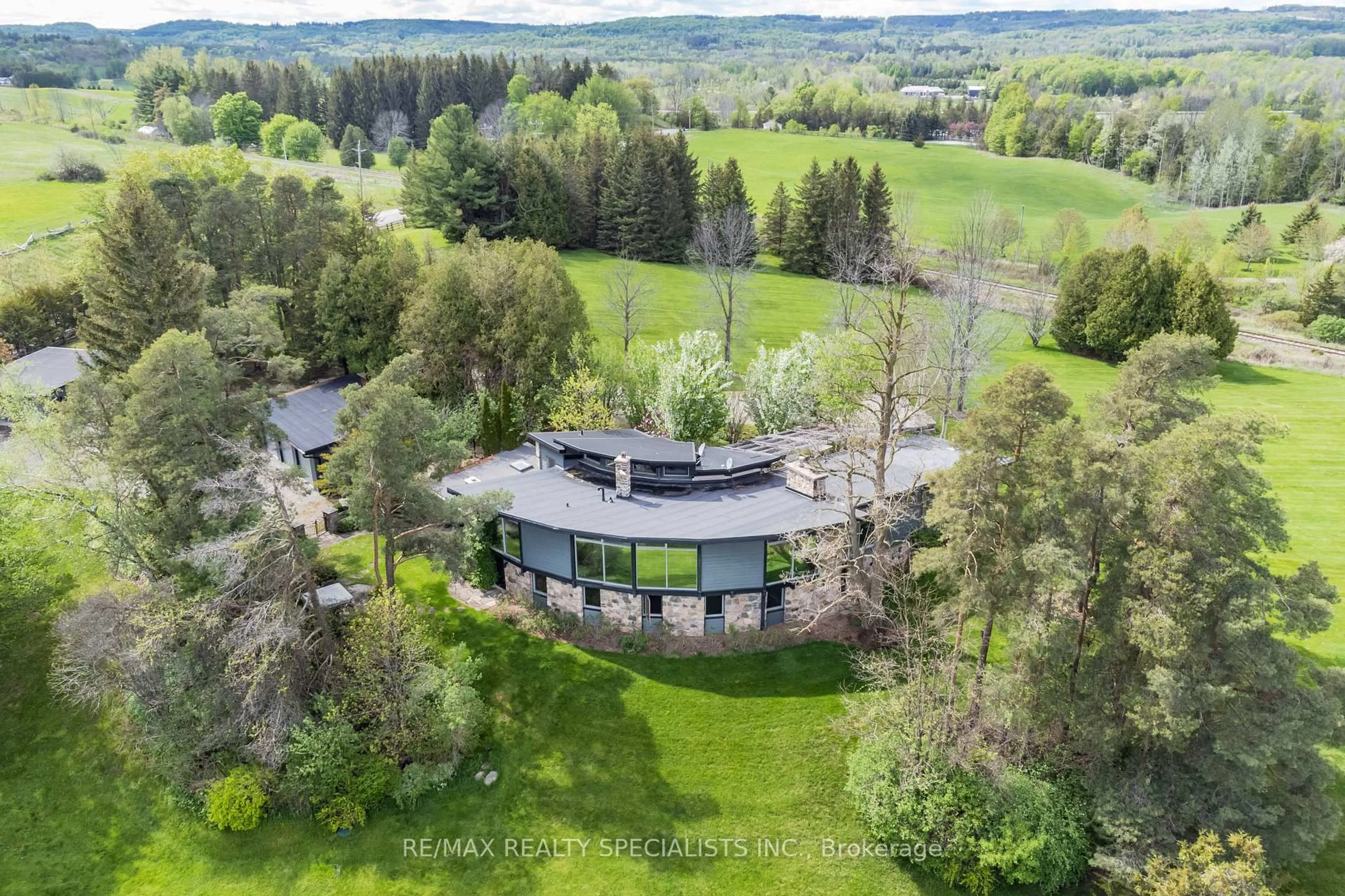A pic from outside/outdoor area/front of a property/back of a property/a pic from drone, forest/trees view for 16167 Mclaughlin Rd, Caledon Ontario L7C 1J4