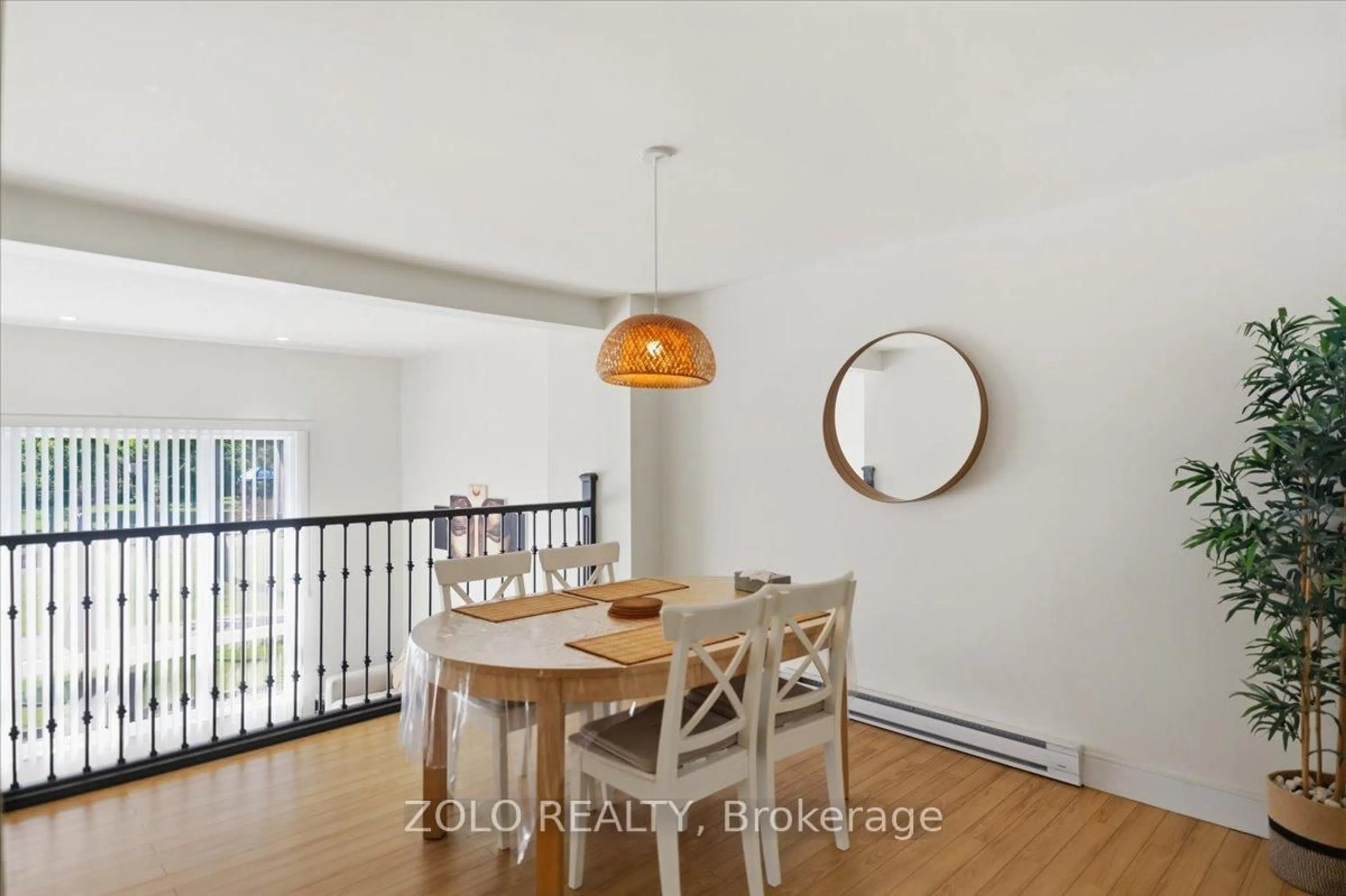 Dining room, wood/laminate floor for 98 Darras Crt, Brampton Ontario L6T 1W7
