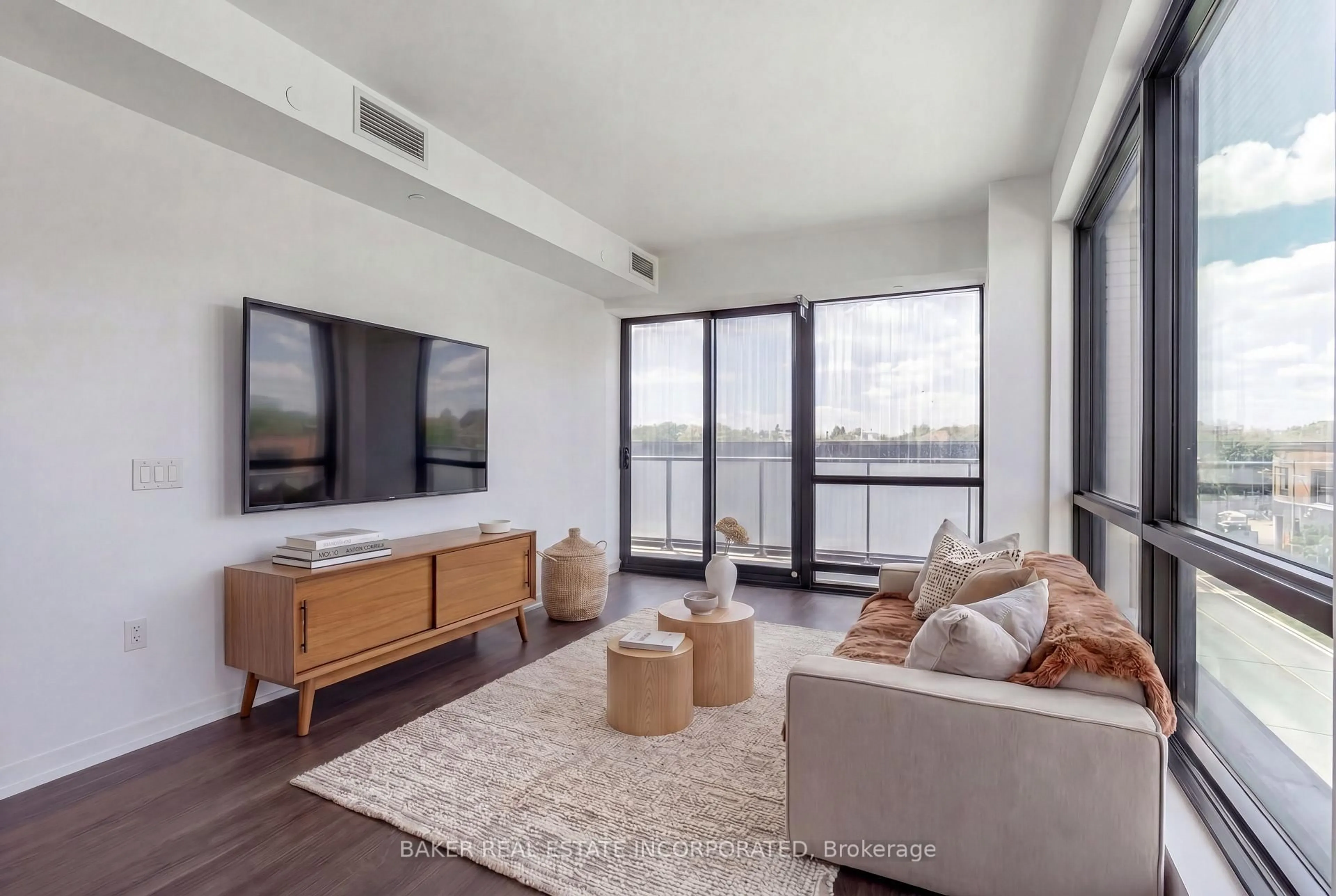 Living room with furniture, unknown for 251 Masonry Way #306, Mississauga Ontario L5H 0B3