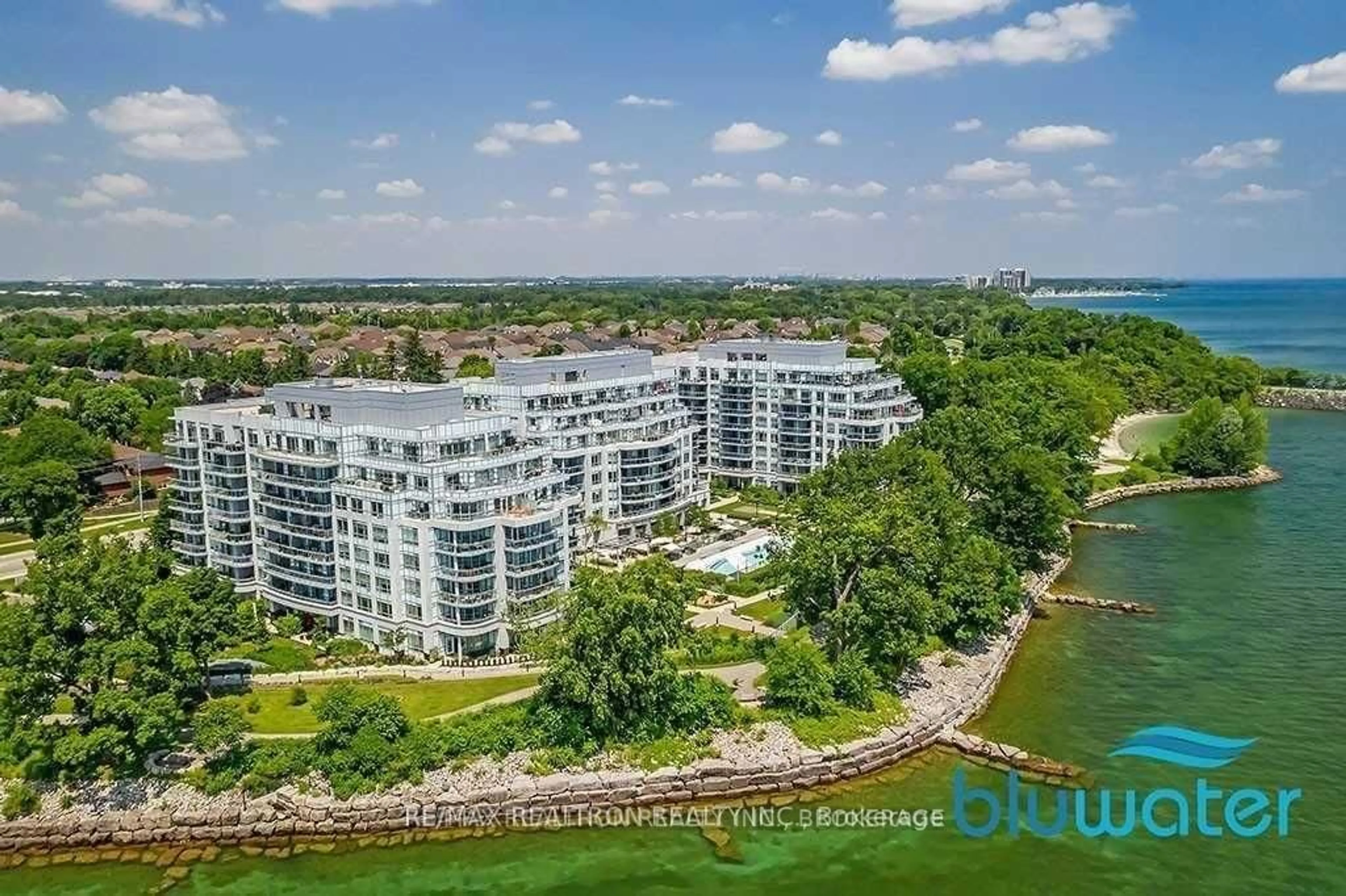 A pic from outside/outdoor area/front of a property/back of a property/a pic from drone, water/lake/river/ocean view for 3500 Lakeshore Rd #229, Oakville Ontario L6L 0B4