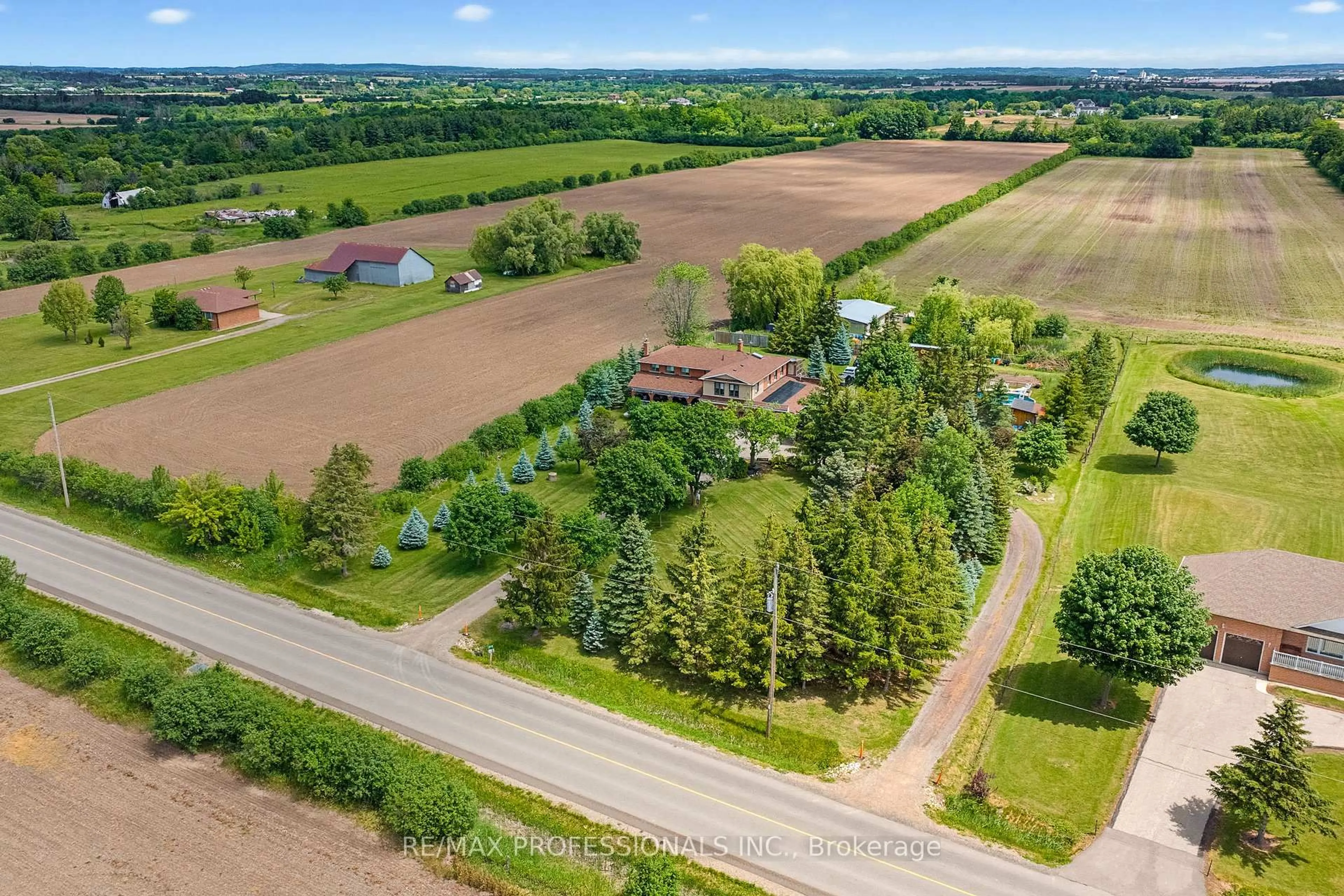 A pic from outside/outdoor area/front of a property/back of a property/a pic from drone, unknown for 13289 Innis Lake Rd, Caledon Ontario L7C 2Z6
