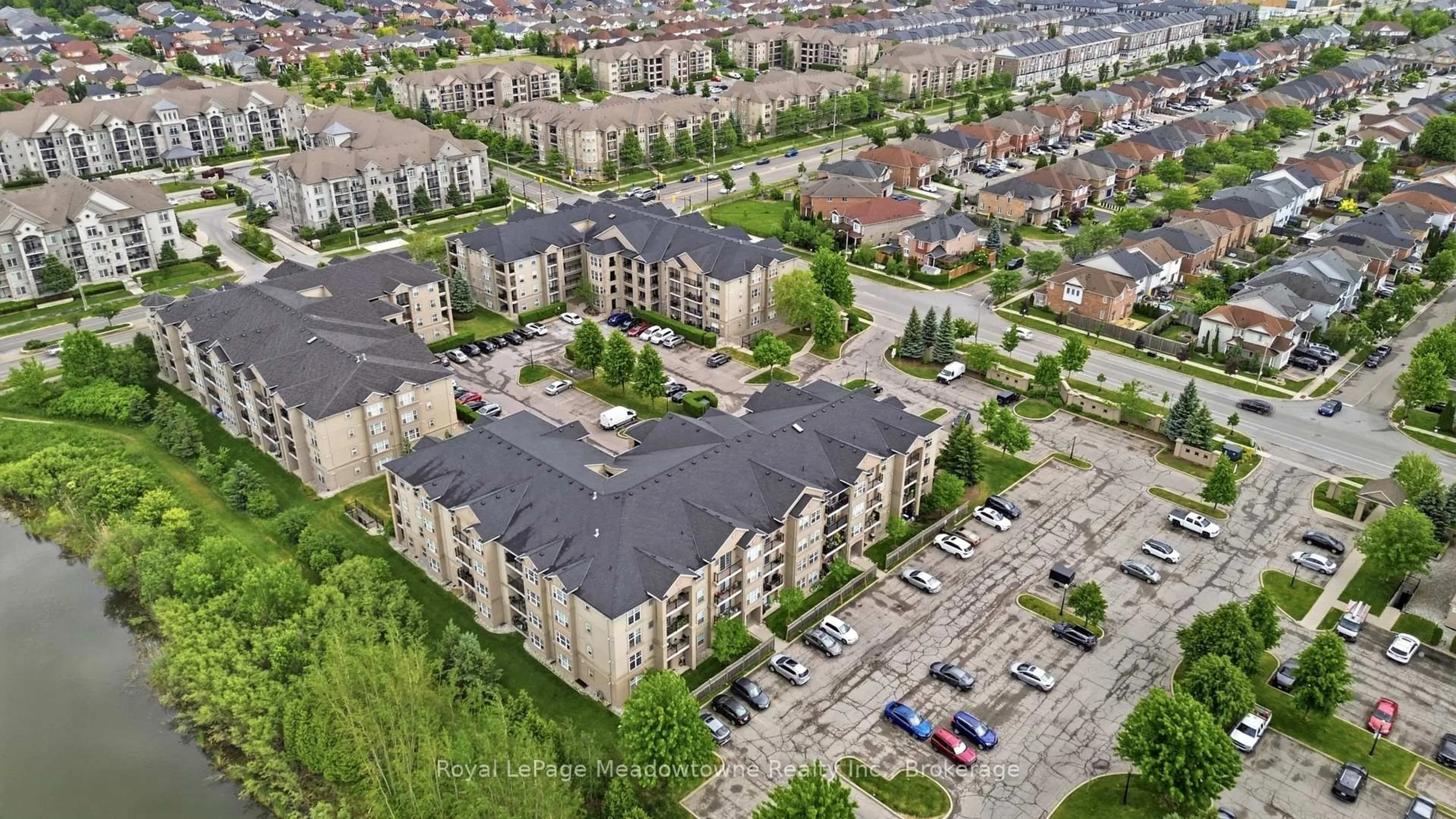 A pic from outside/outdoor area/front of a property/back of a property/a pic from drone, city buildings view from balcony for 1483 Maple Ave #205, Milton Ontario L9T 0B6