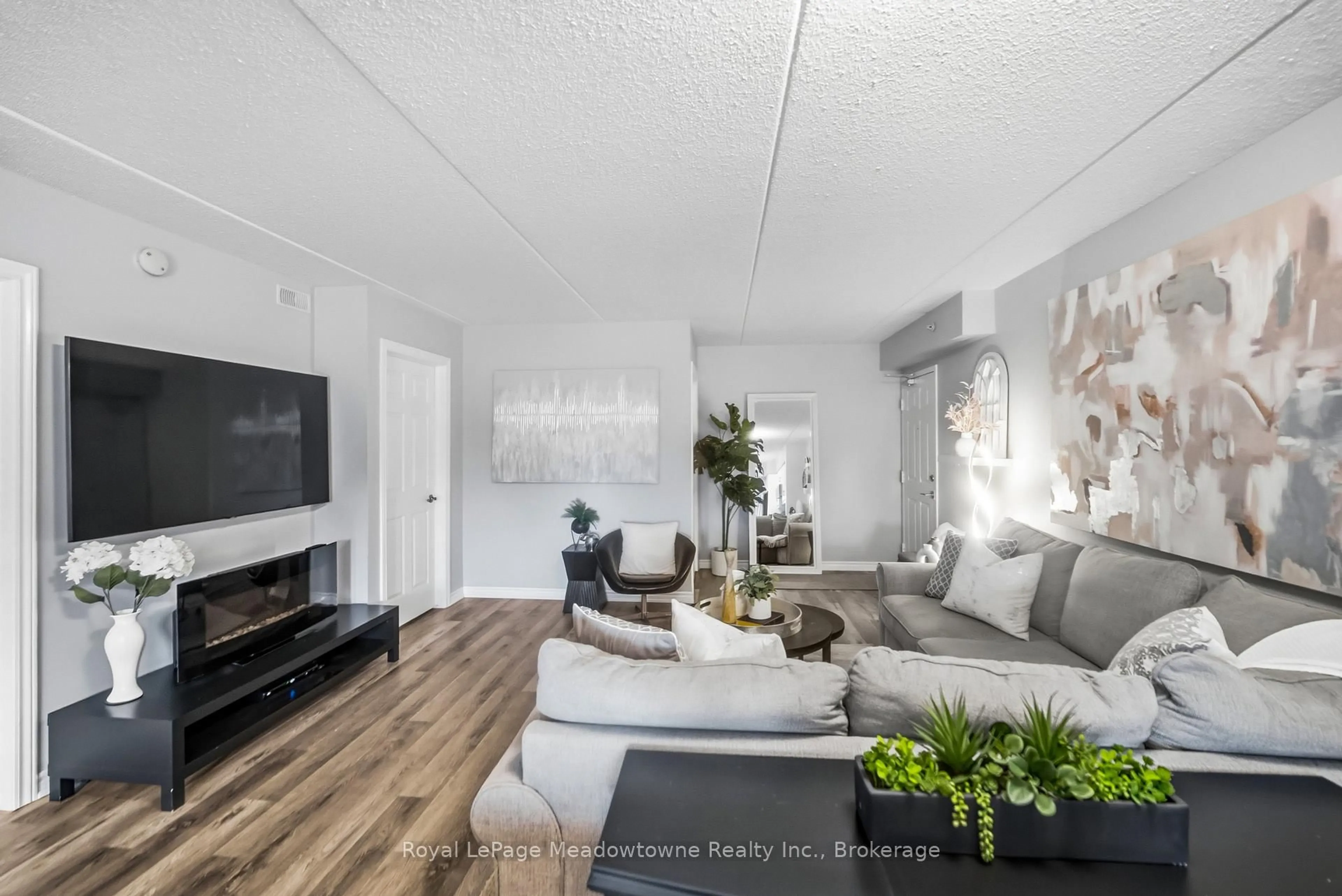 Living room with furniture, unknown for 1483 Maple Ave #205, Milton Ontario L9T 0B6