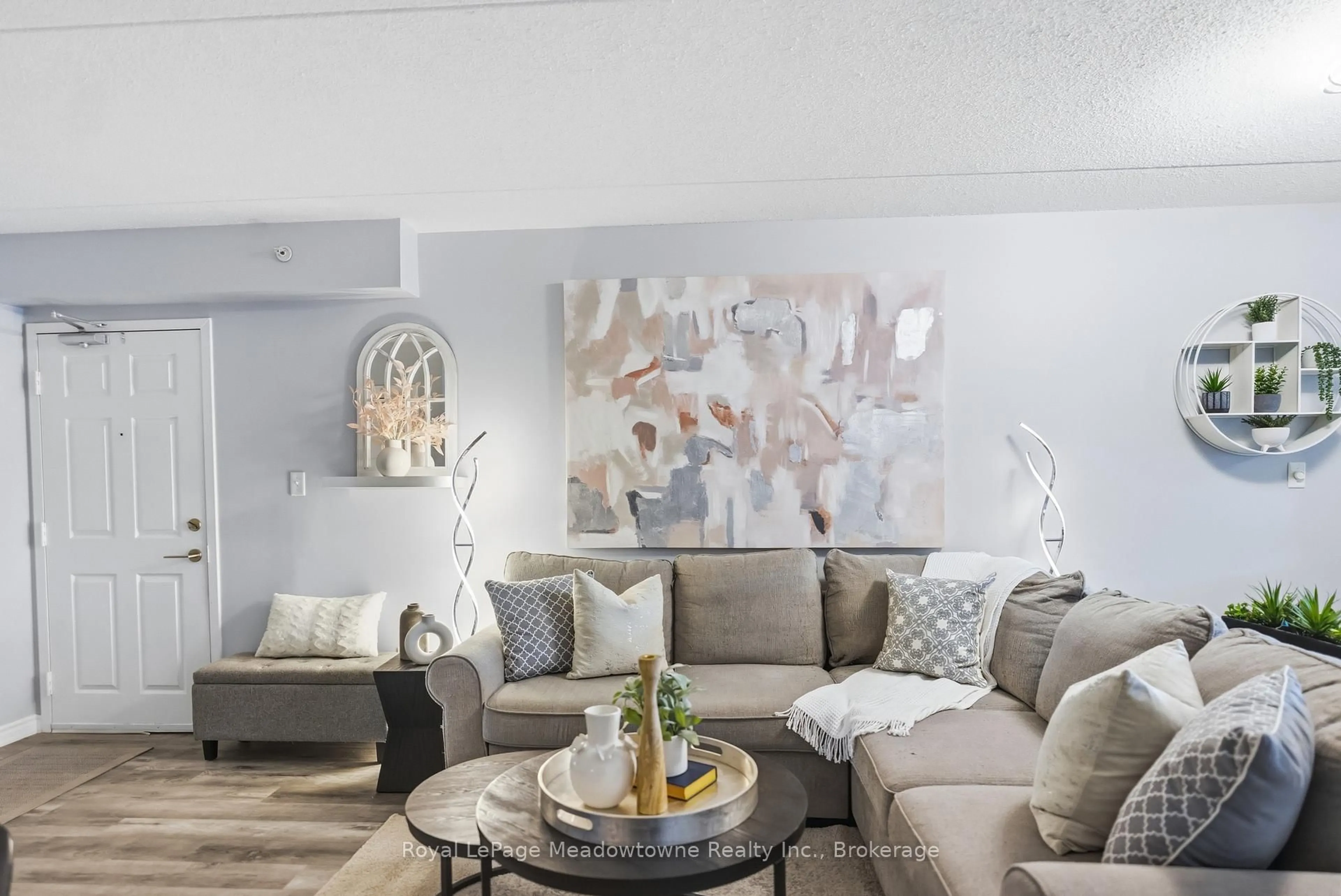 Living room with furniture, unknown for 1483 Maple Ave #205, Milton Ontario L9T 0B6